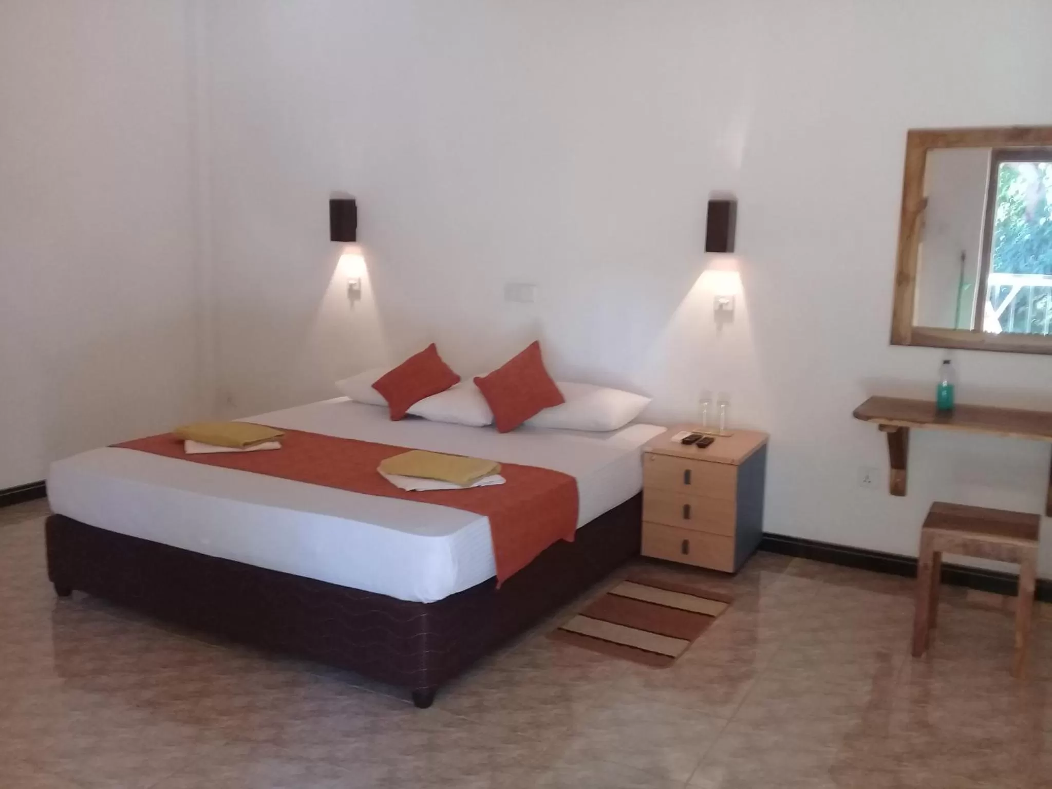 Bed in Kithmi Resort