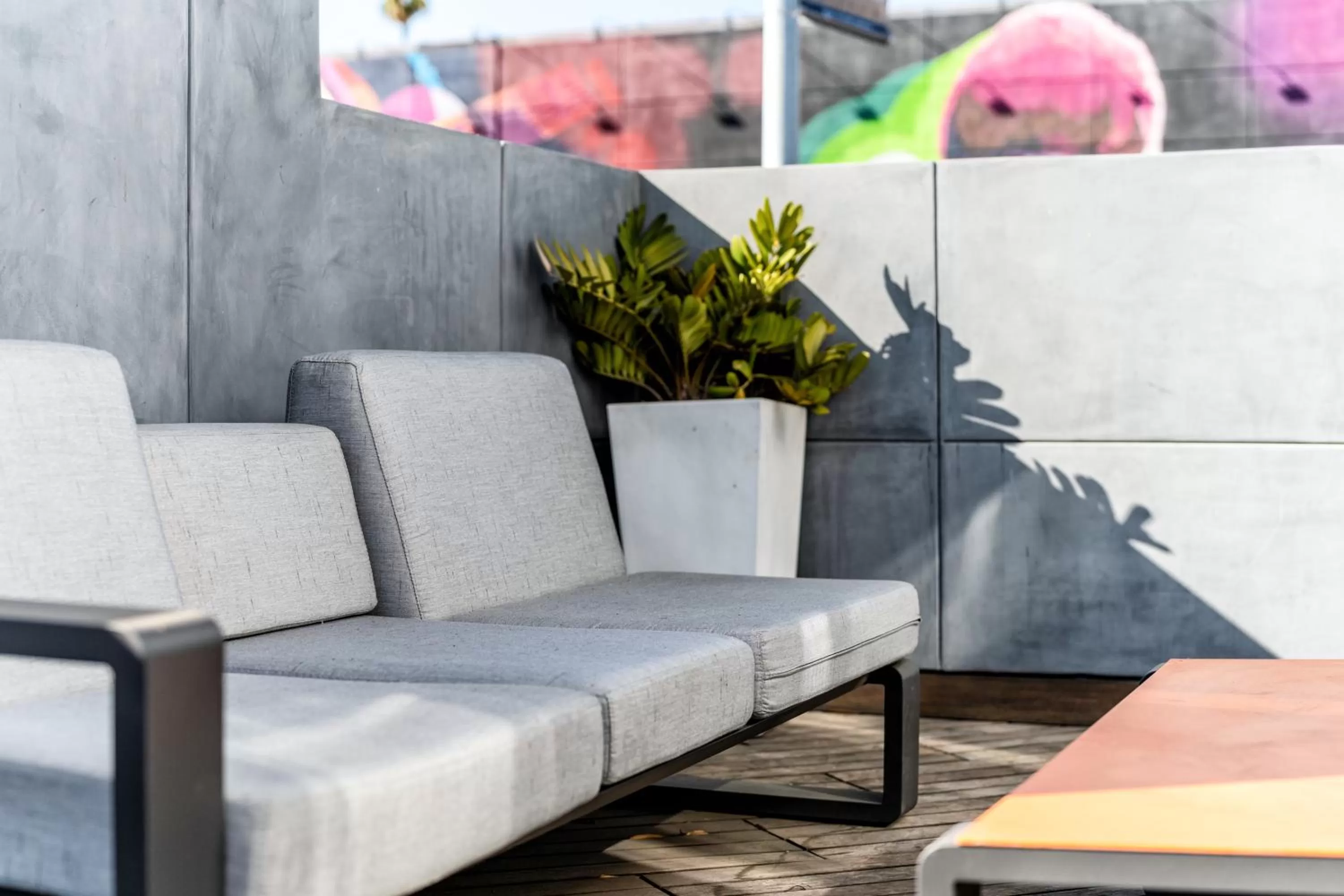 Communal lounge/ TV room in The Moment Hotel