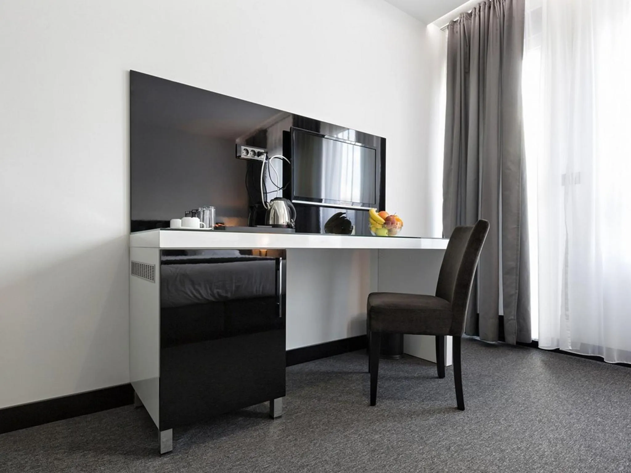 TV and multimedia in Nova City Garni Hotel Signature Collection