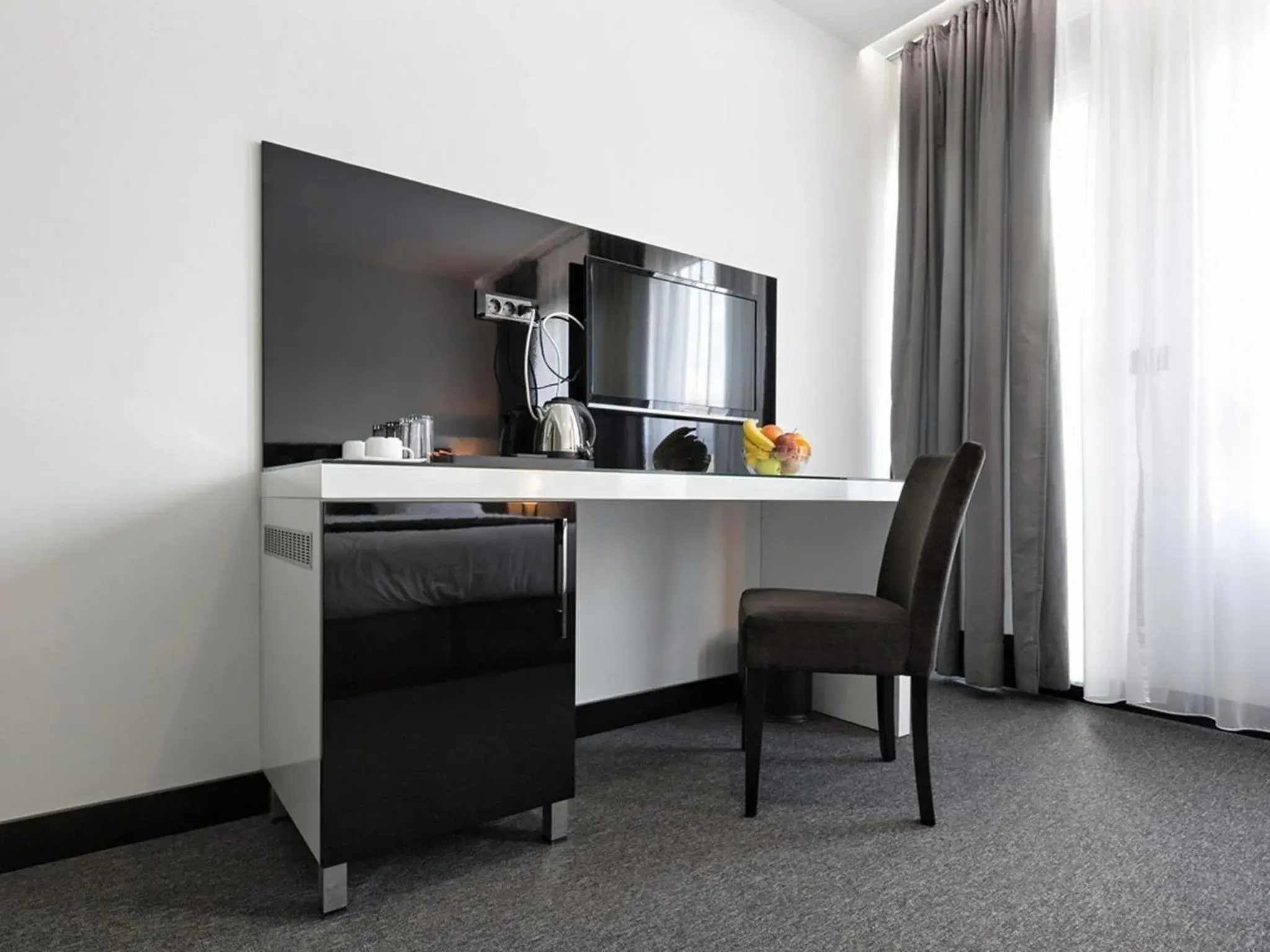 TV and multimedia, Kitchen/Kitchenette in Nova City Hotel Signature Collection Belgrade