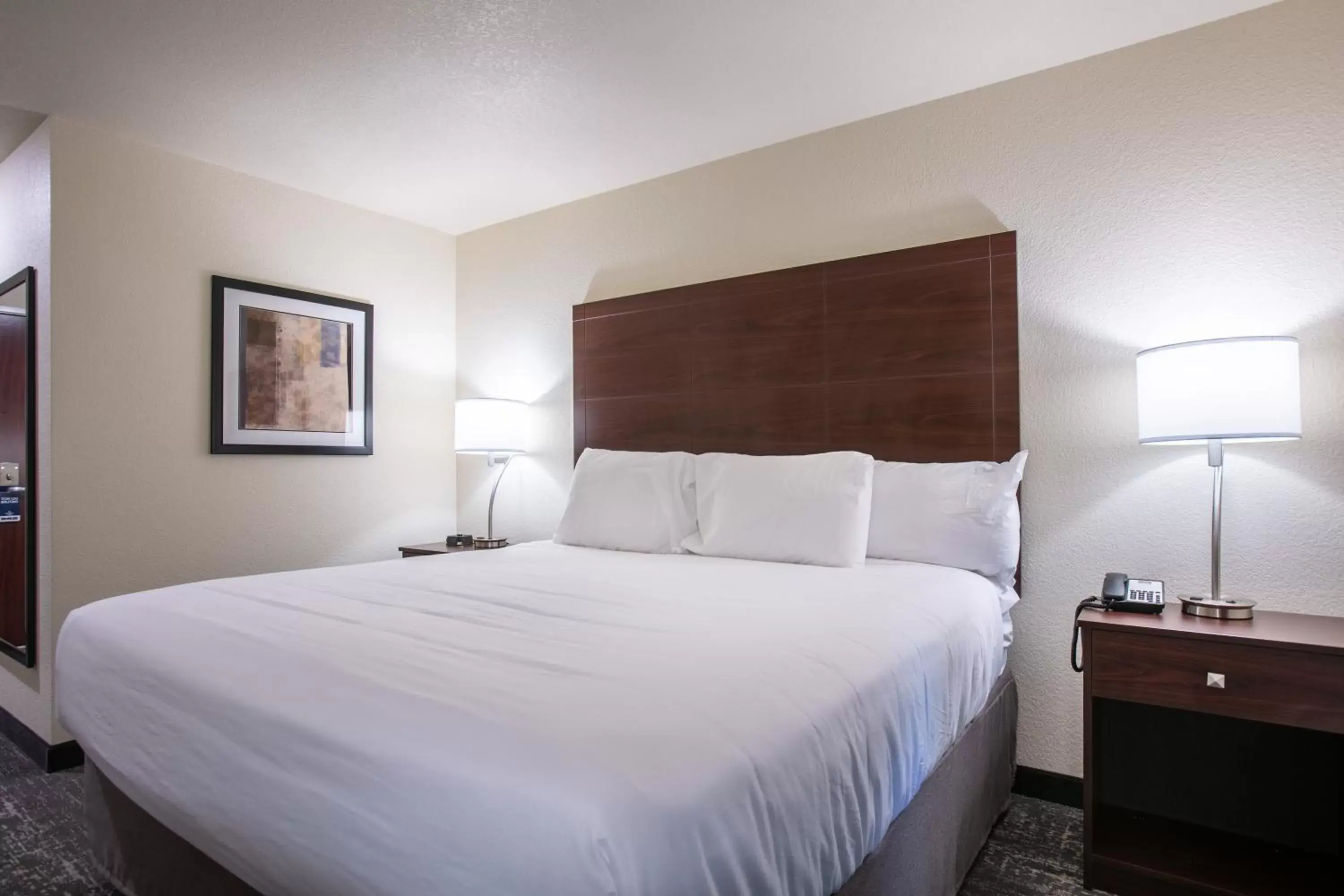 Bed in Cobblestone Inn & Suites - Pine Bluffs