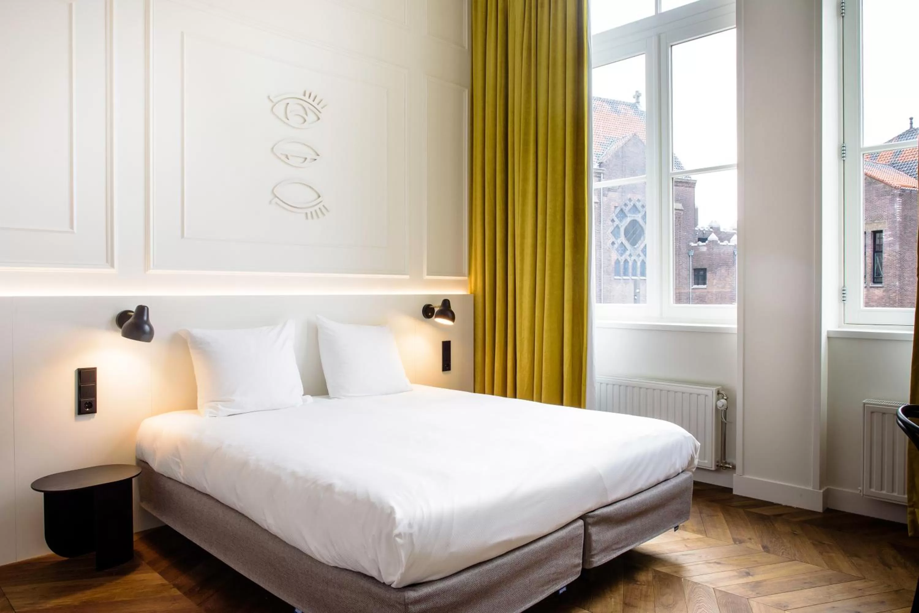 Bed in Hotel Mariënhage