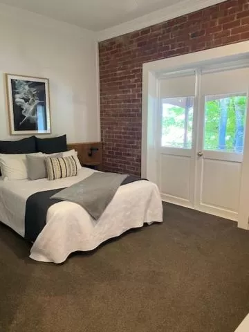 Bed in The Royal Daylesford Hotel