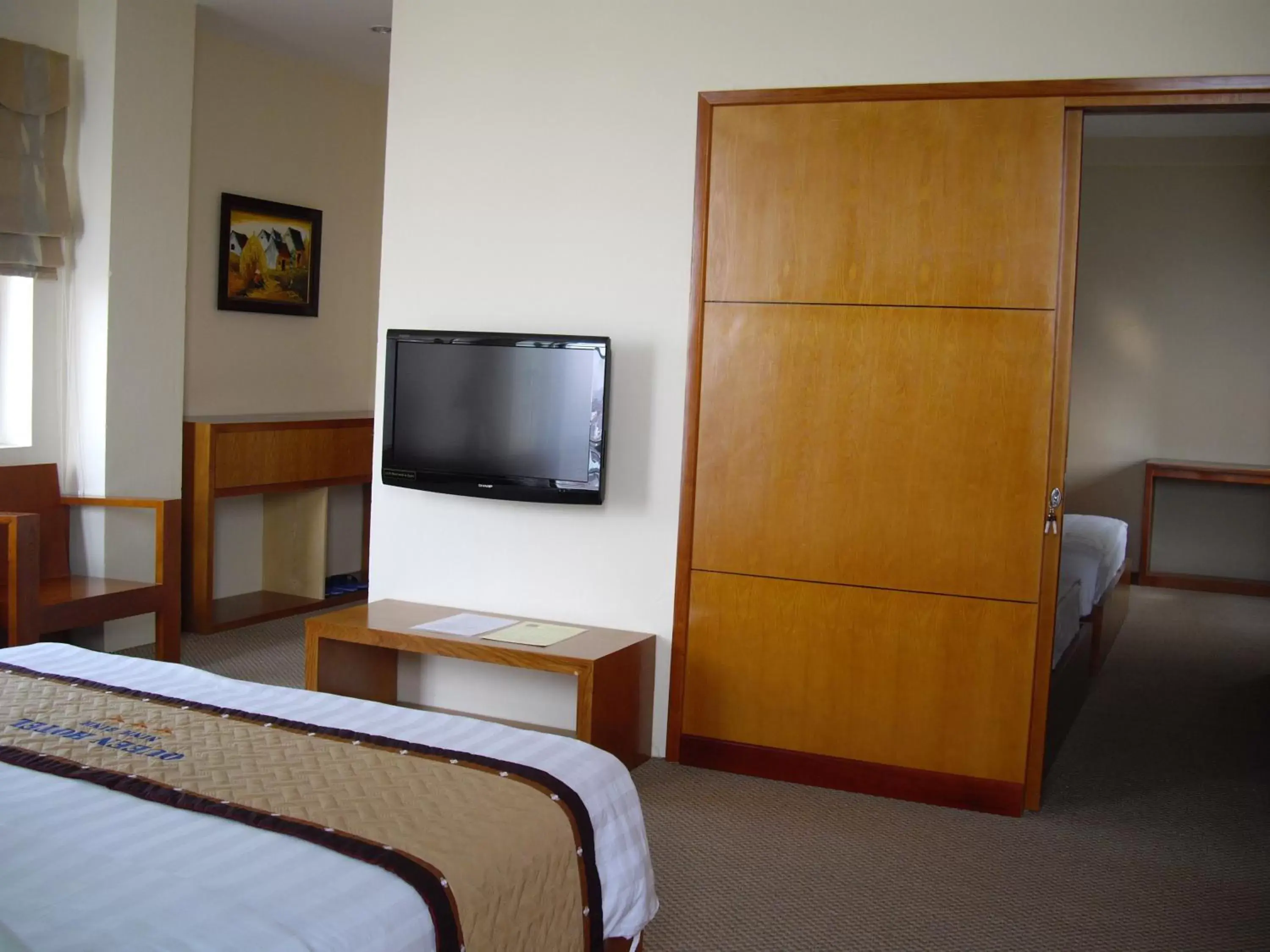 Bedroom, TV/Entertainment Center in The Queen Hotel Ninh Binh