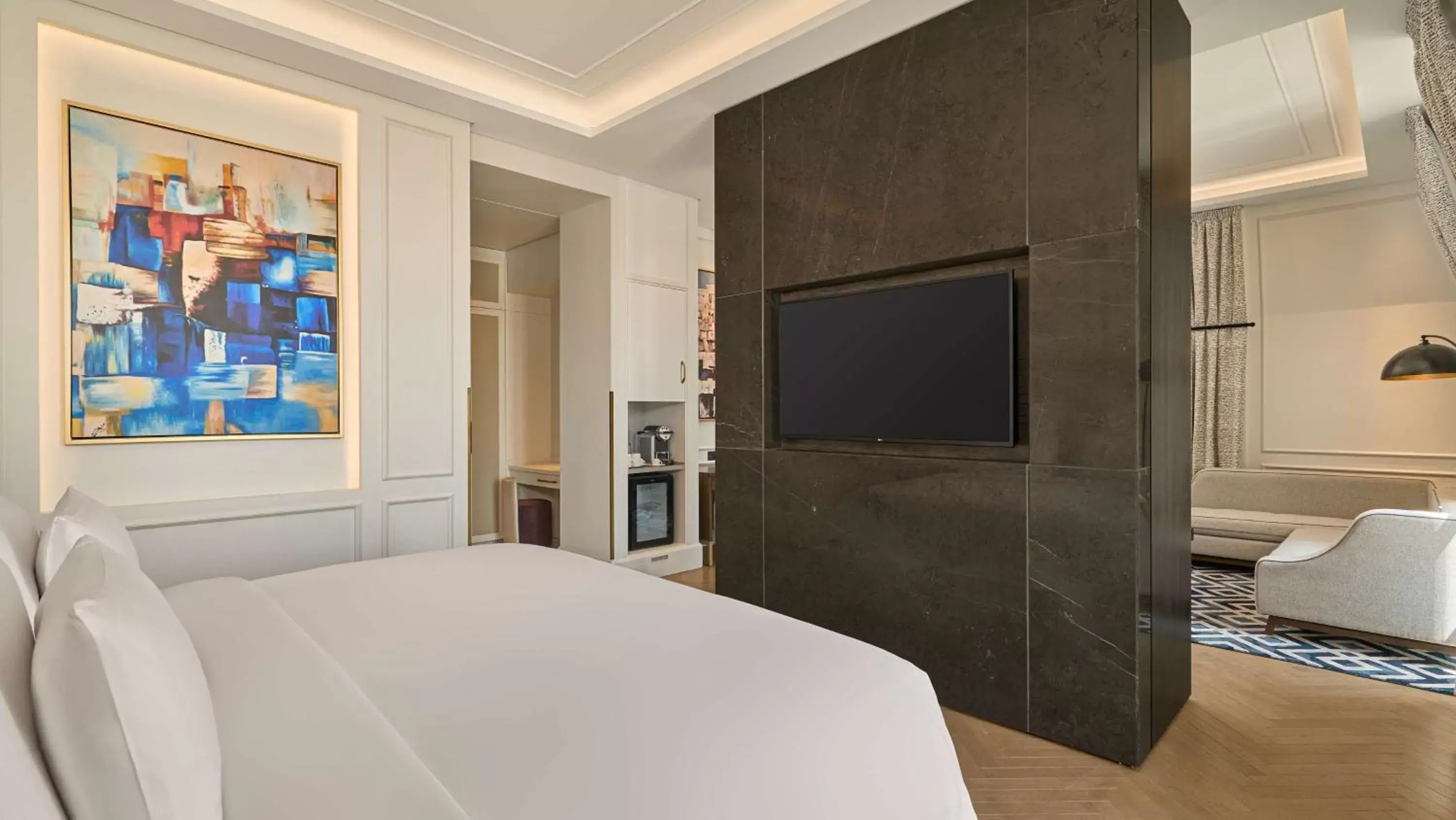 Bedroom, TV/Entertainment Center in Mansard Riyadh, a Radisson Collection Hotel