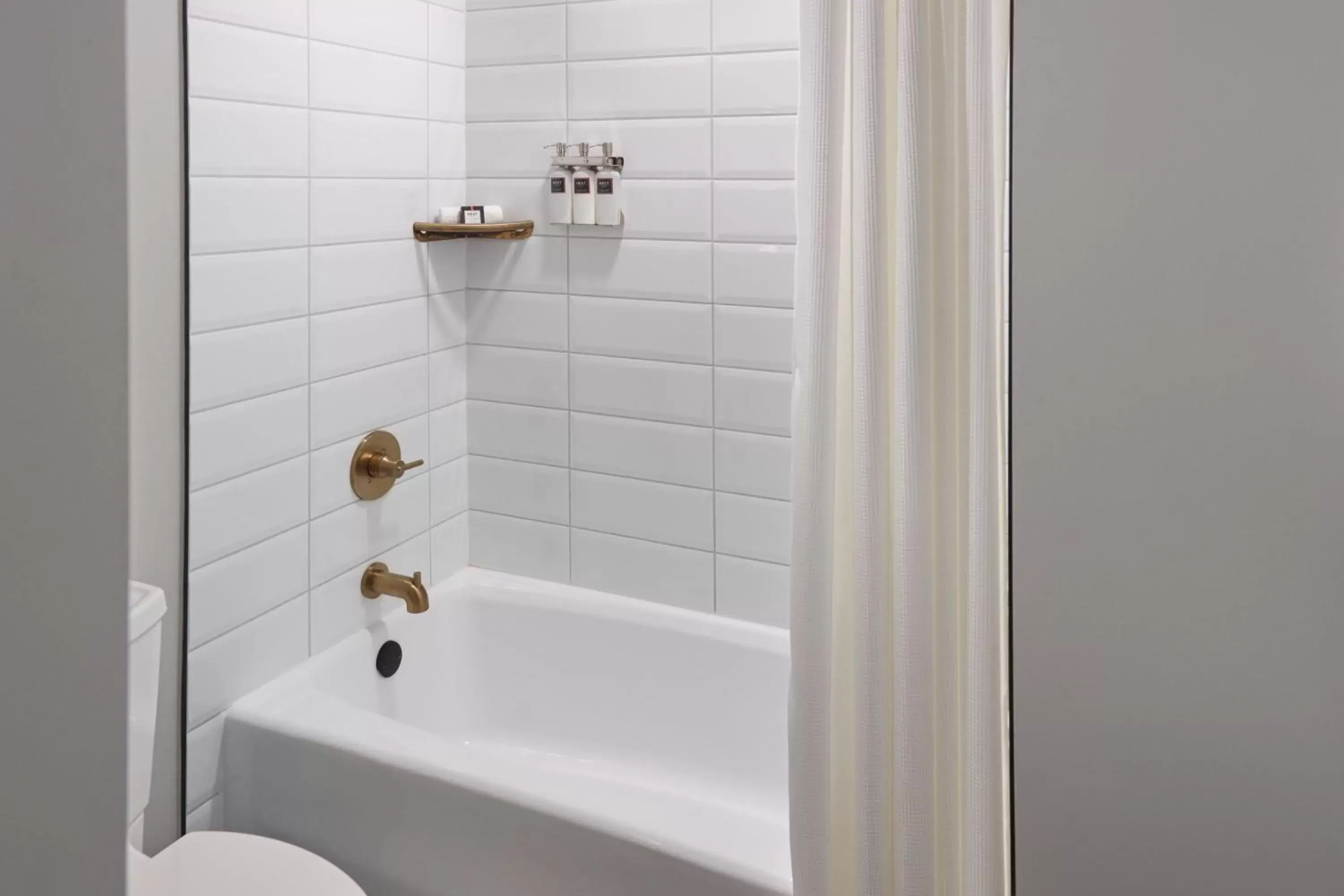 Bathroom in The Tremont House, Galveston, a Tribute Portfolio Hotel