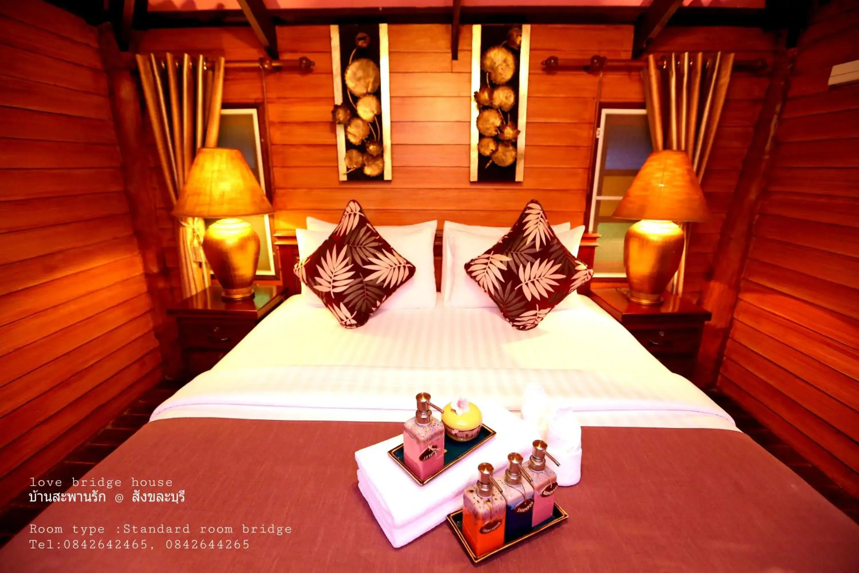 Bed in Love Bridge House Resort