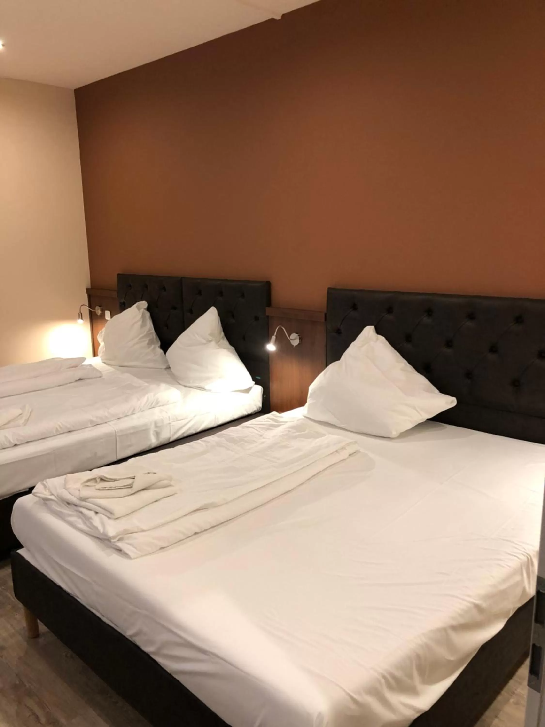 Bed in Hotel Poseidon