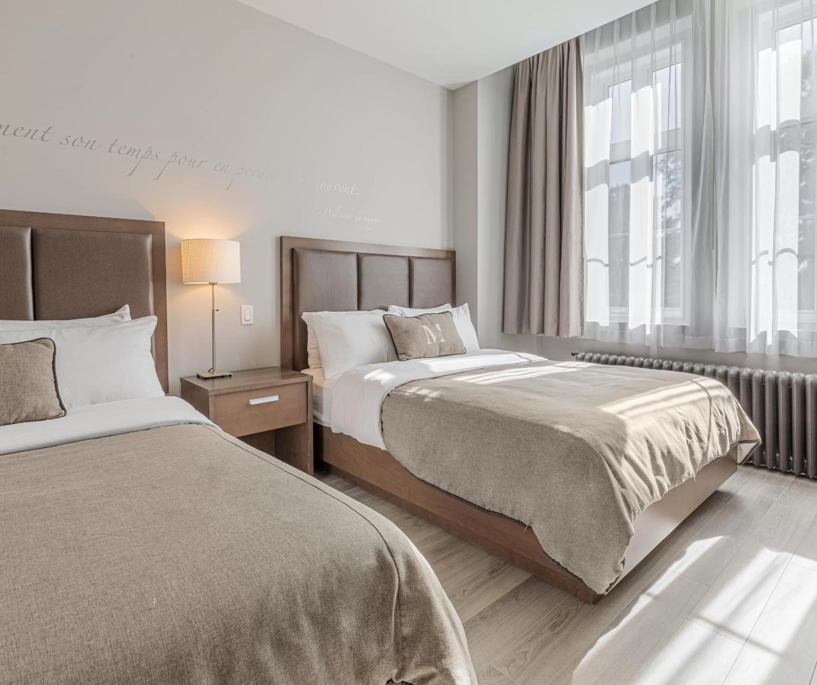 Bed in Hotel Montfort Nicolet