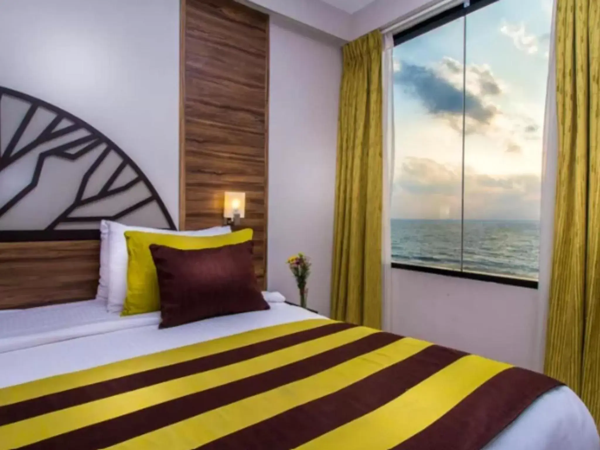 View (from property/room), Bed in The Ocean Colombo - Guaranteed Sea View Rooms View (from property/room), Bed in The Ocean Colombo - Guaranteed Sea View Rooms