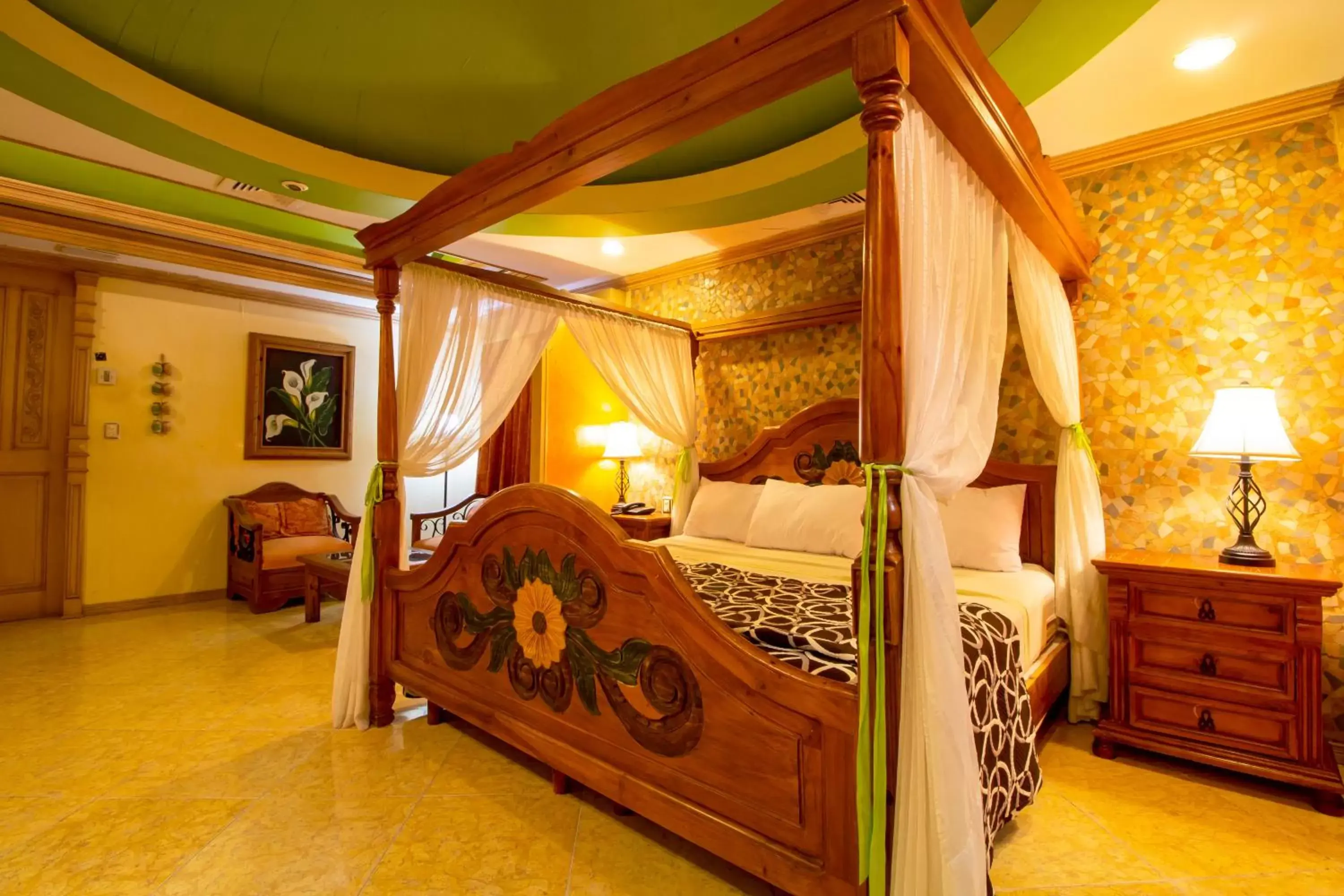 Photo of the whole room, Bed in Suites Flamboyanes