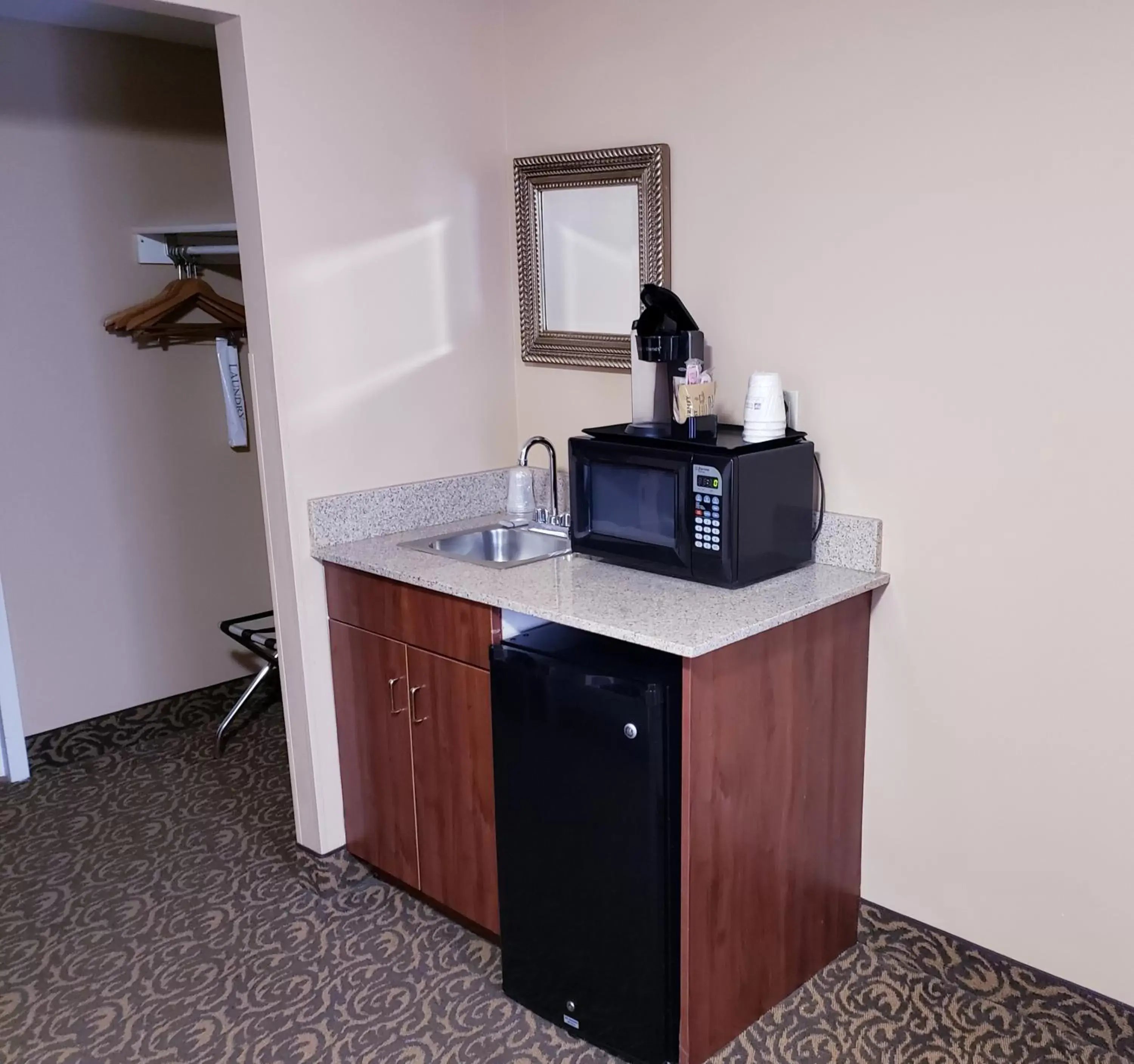 Kitchen/Kitchenette in SureStay Plus Hotel by Best Western Black River Falls