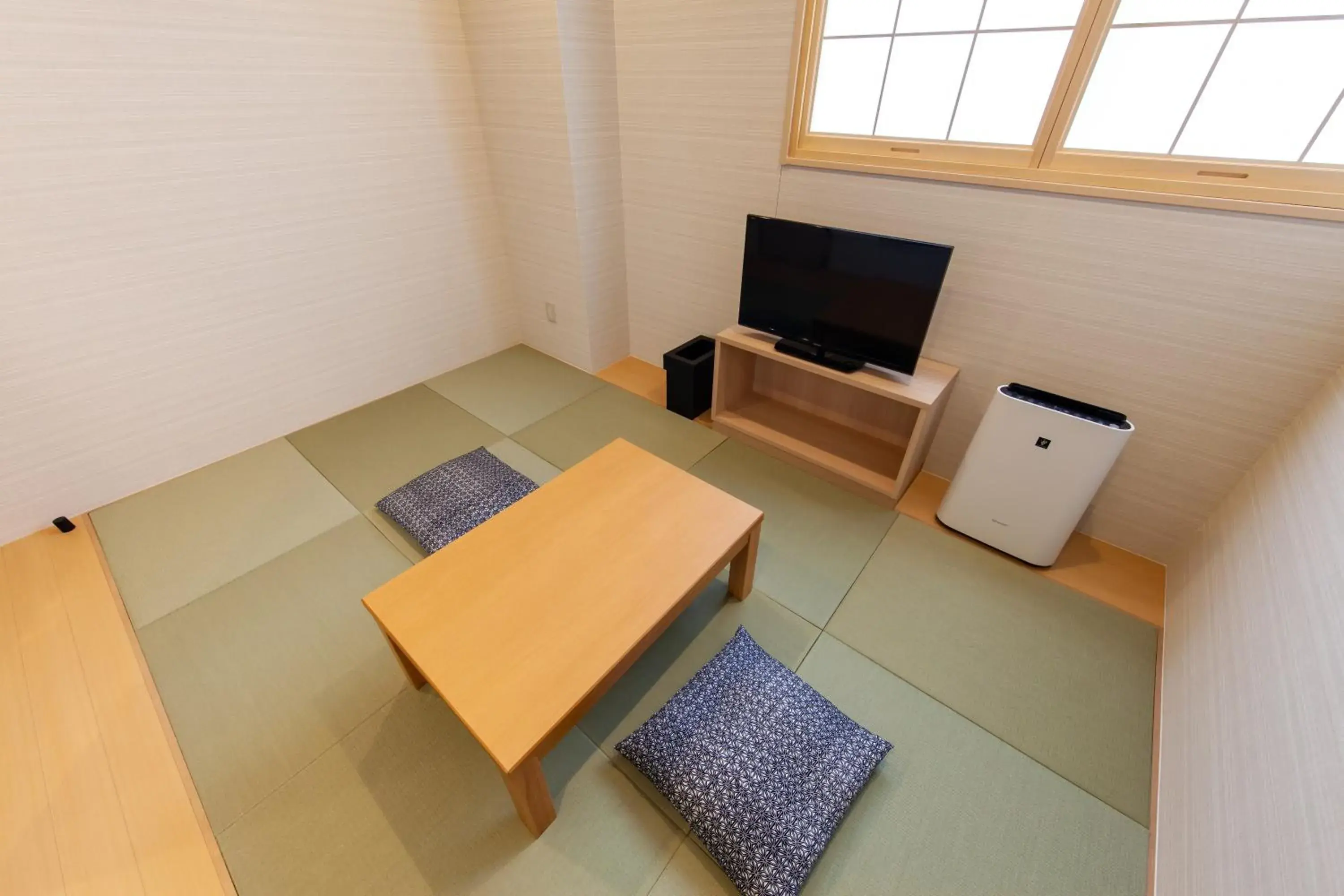 Photo of the whole room, TV/Entertainment Center in Y's CABIN&HOTEL Naha Kokusai Street