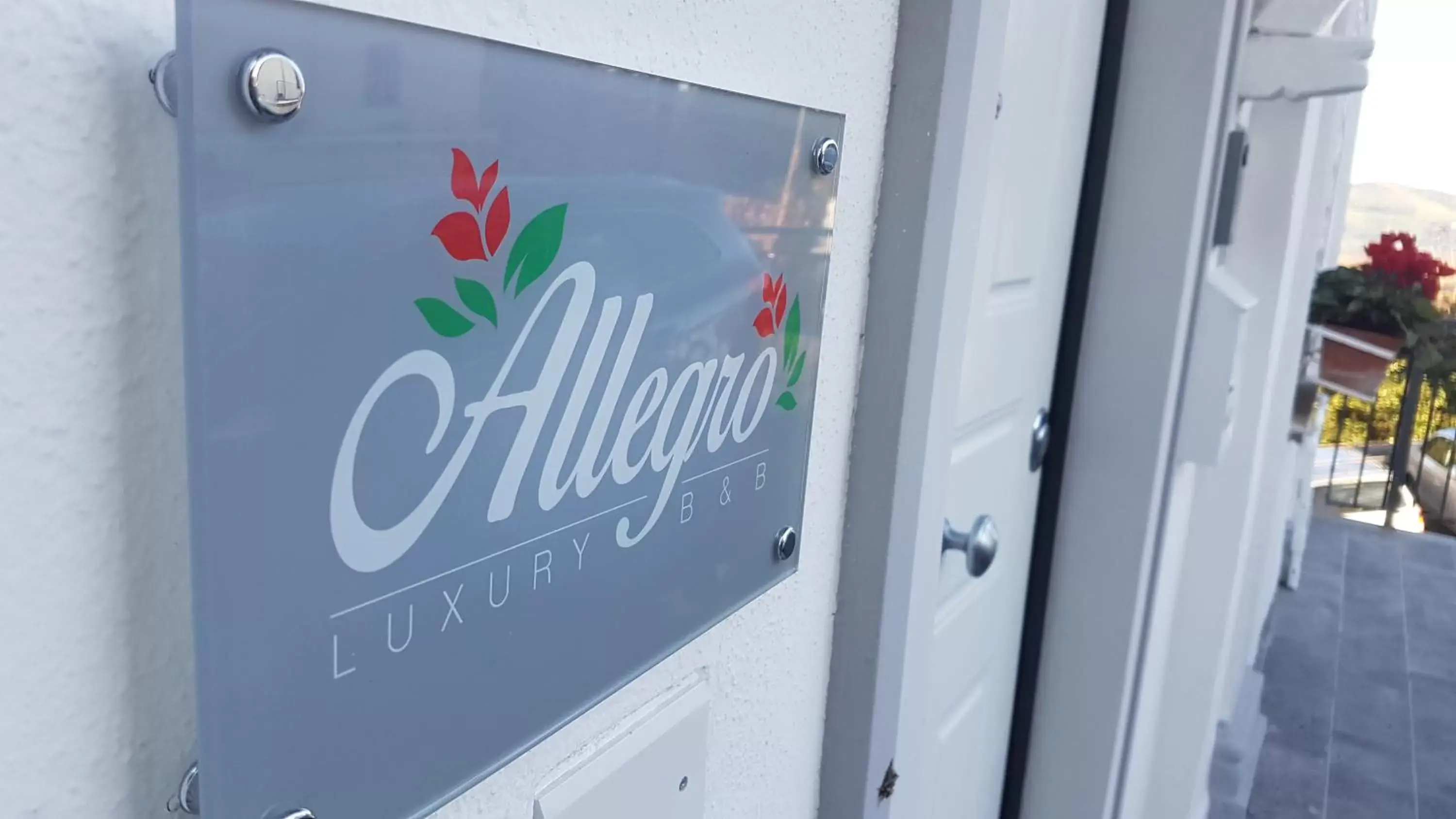 Property Logo/Sign in Allegro Luxury B&B