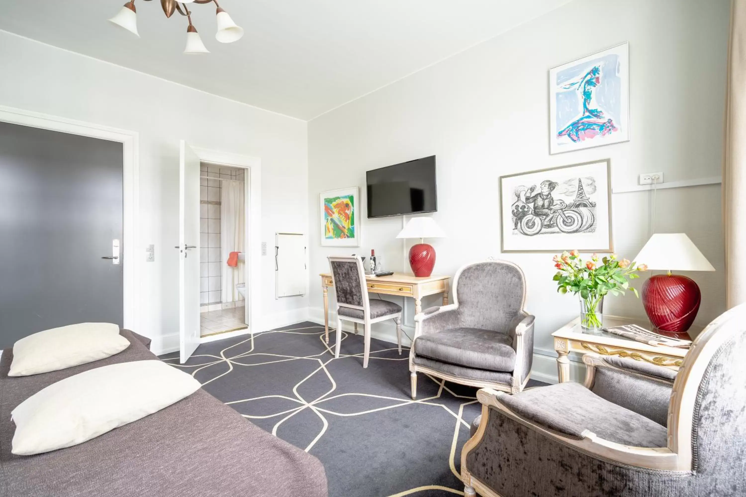 Bedroom, Seating Area in Hotel Dania