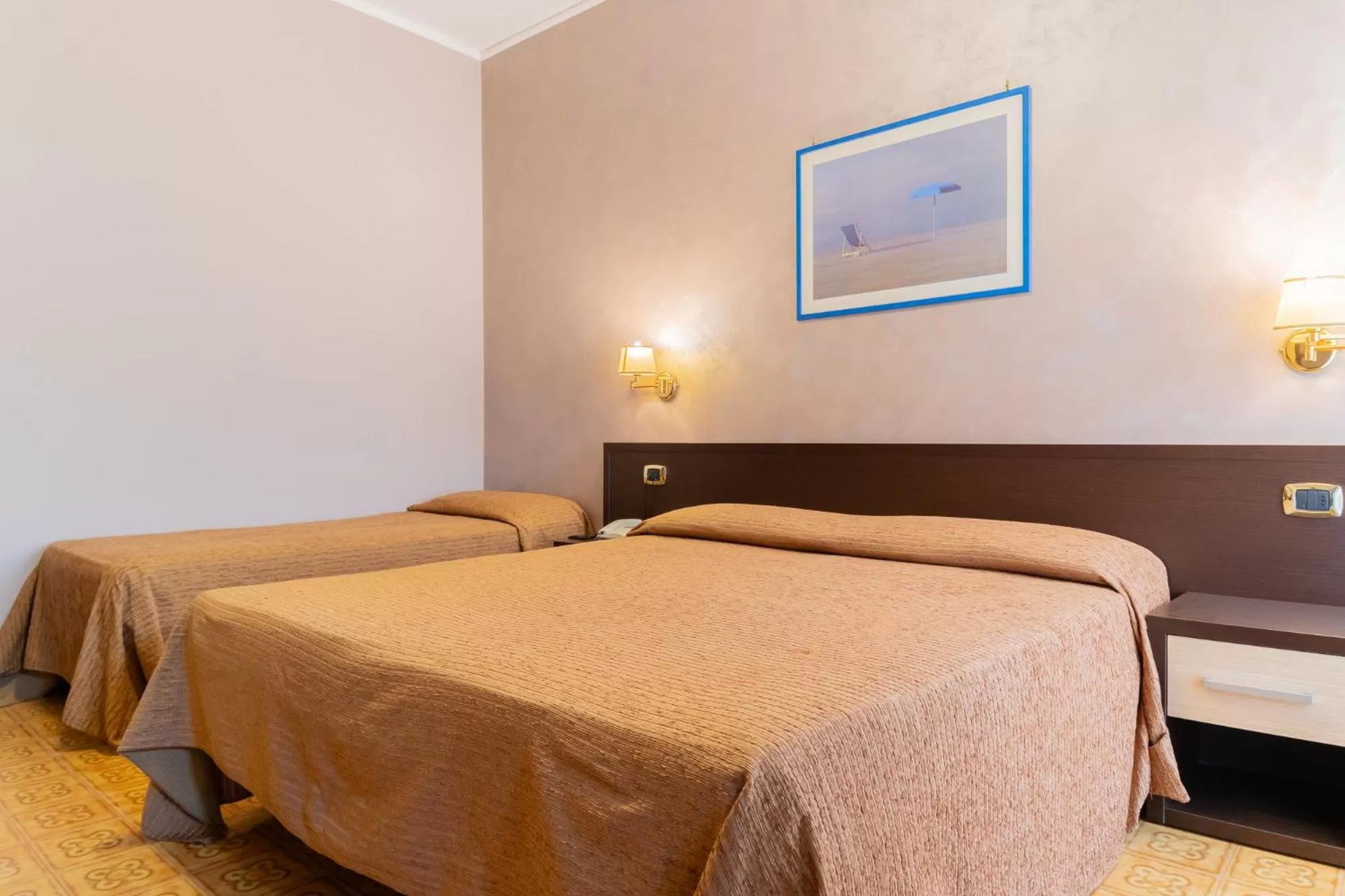 Bed in Hotel Riviera