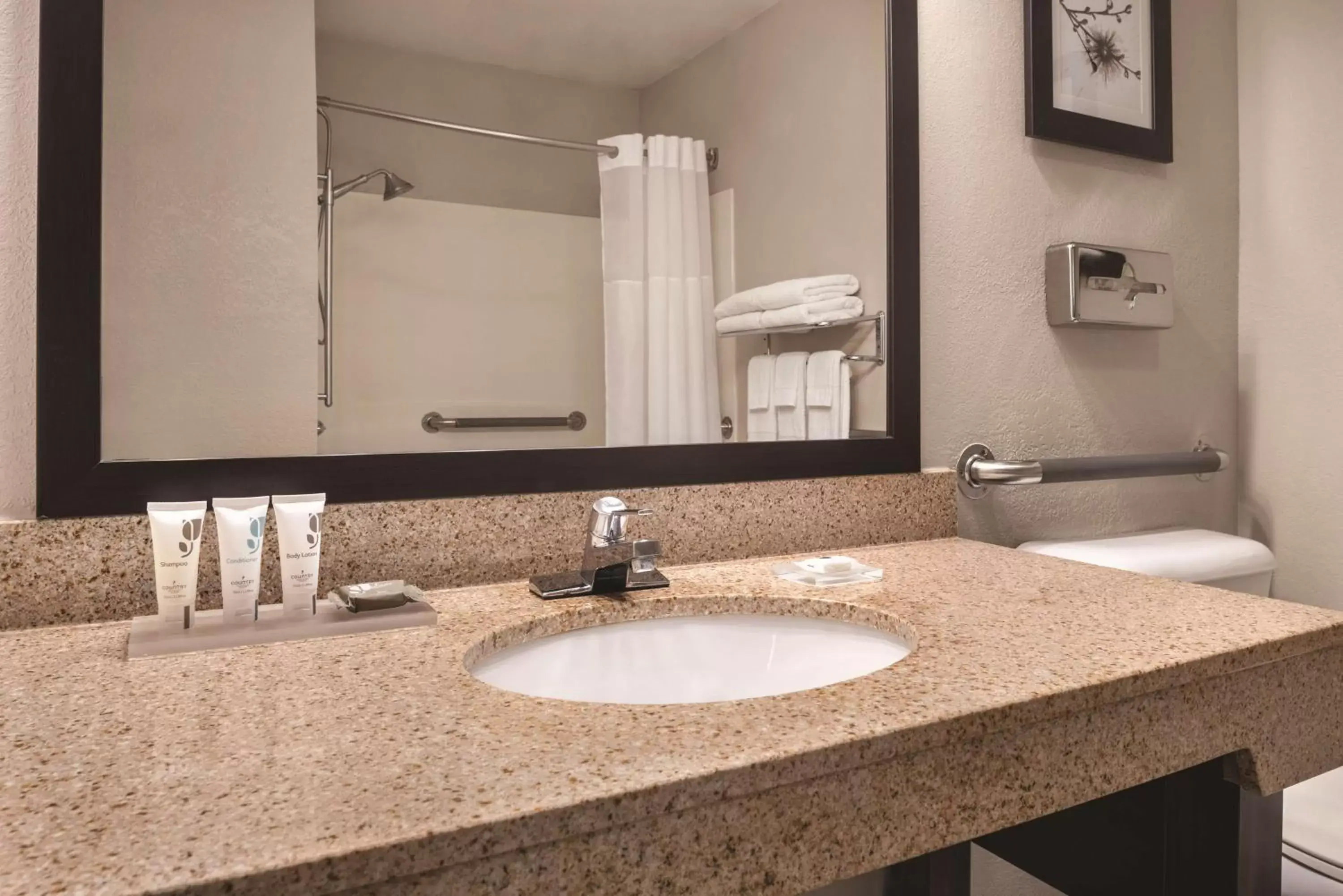 Bathroom in Country Inn & Suites by Radisson, Mt. Pleasant-Racine West, WI