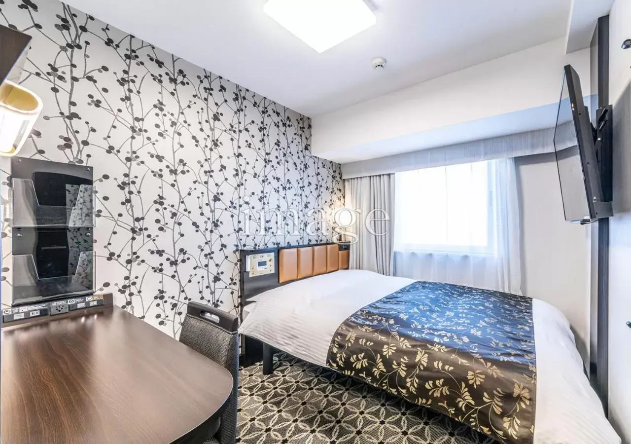 Photo of the whole room, Bed in APA Hotel & Resort Niigata Ekimae Odori