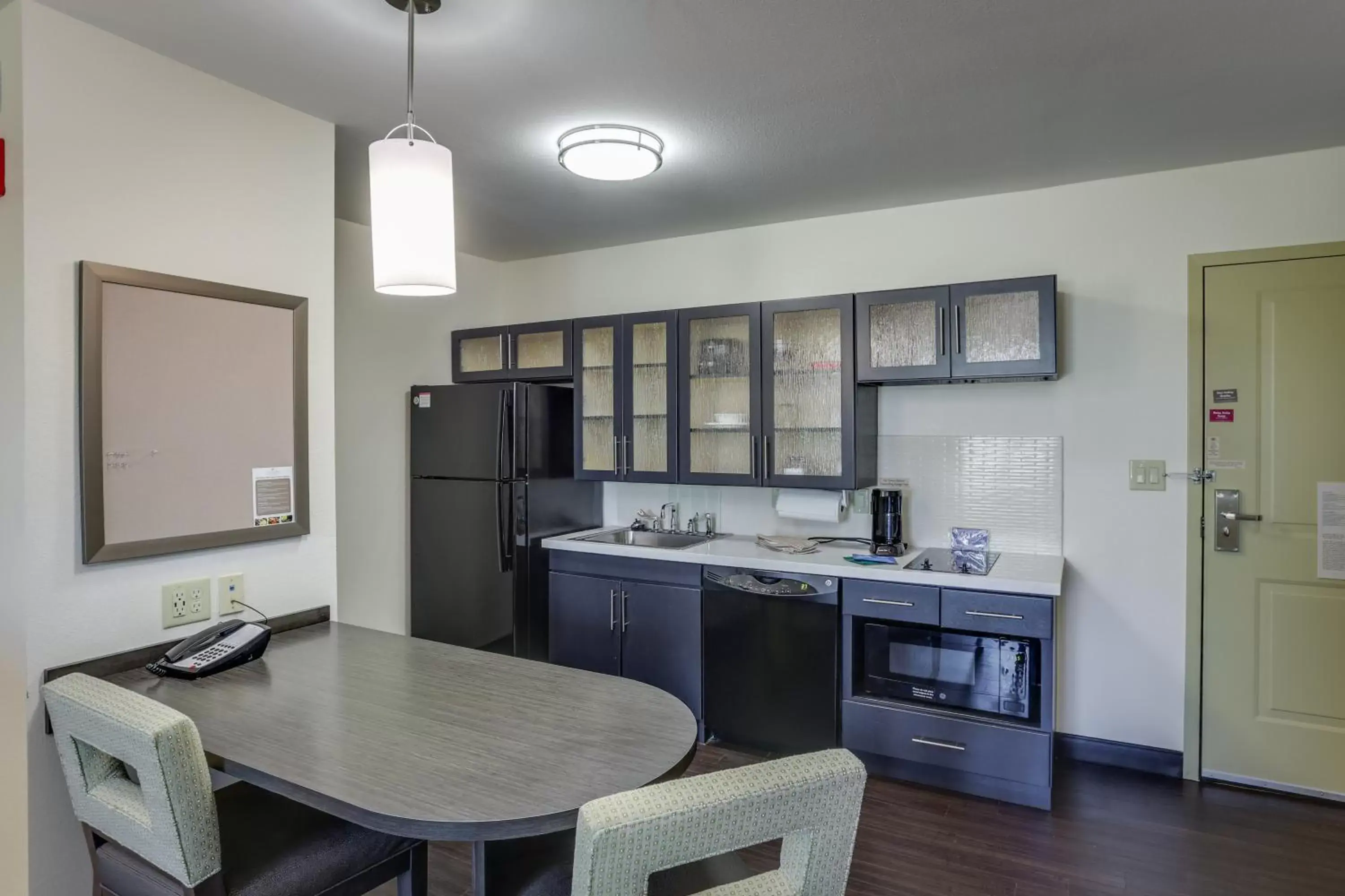 Photo of the whole room, Kitchen/Kitchenette in Candlewood Suites College Station, an IHG Hotel