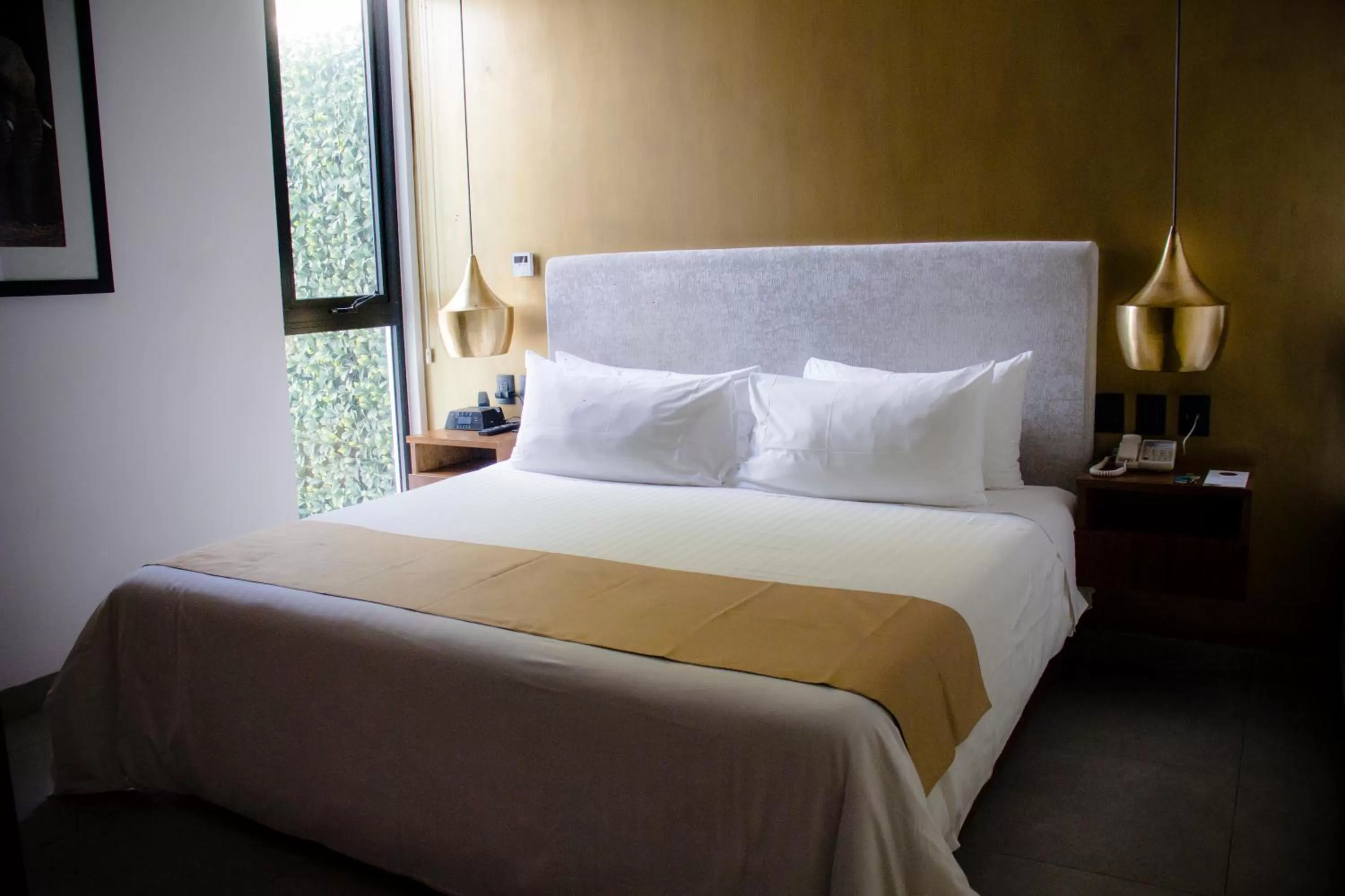 Bed in IT Boutique Hotel & Restaurant