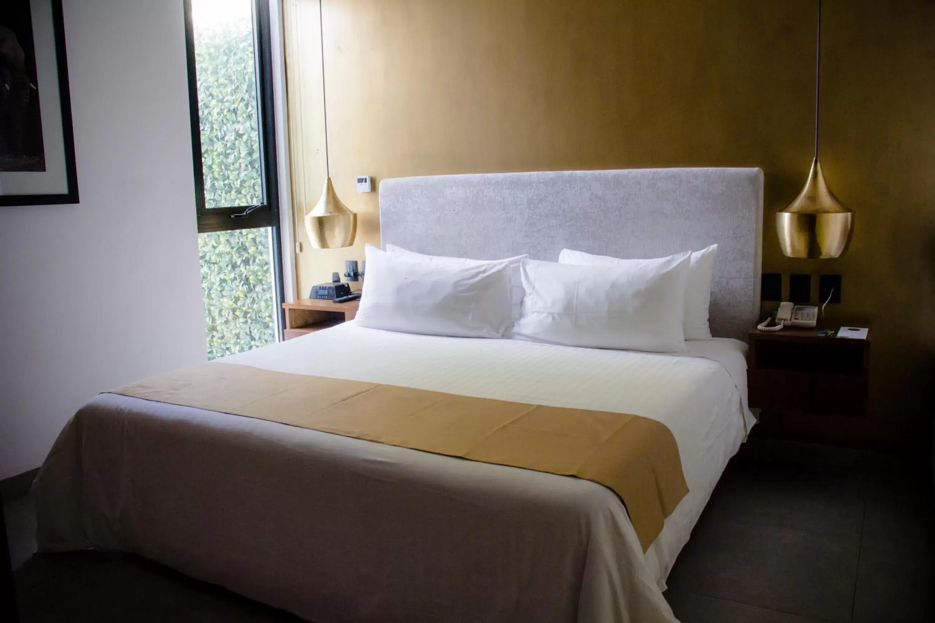 Bed in IT Boutique Hotel & Restaurant Bed in IT Boutique Hotel & Restaurant