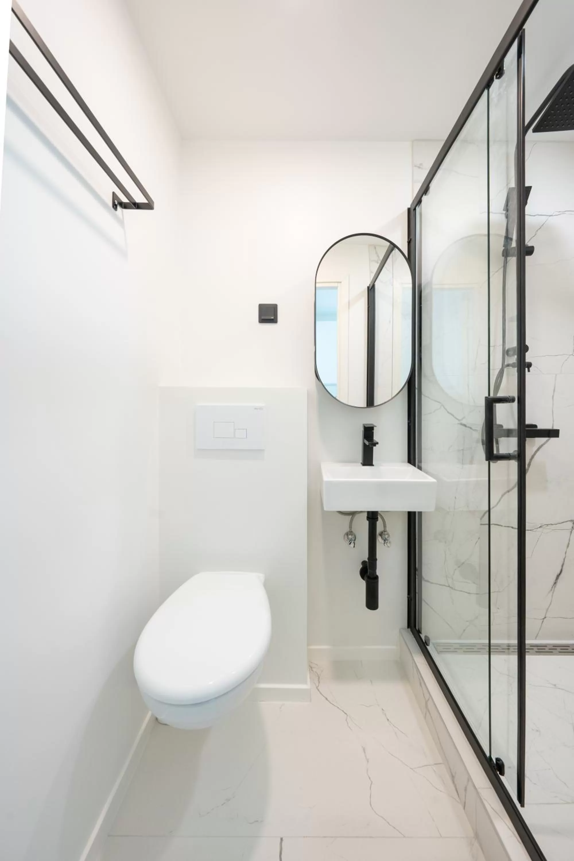 Shower in Oasis Airport Studios by RevalHome