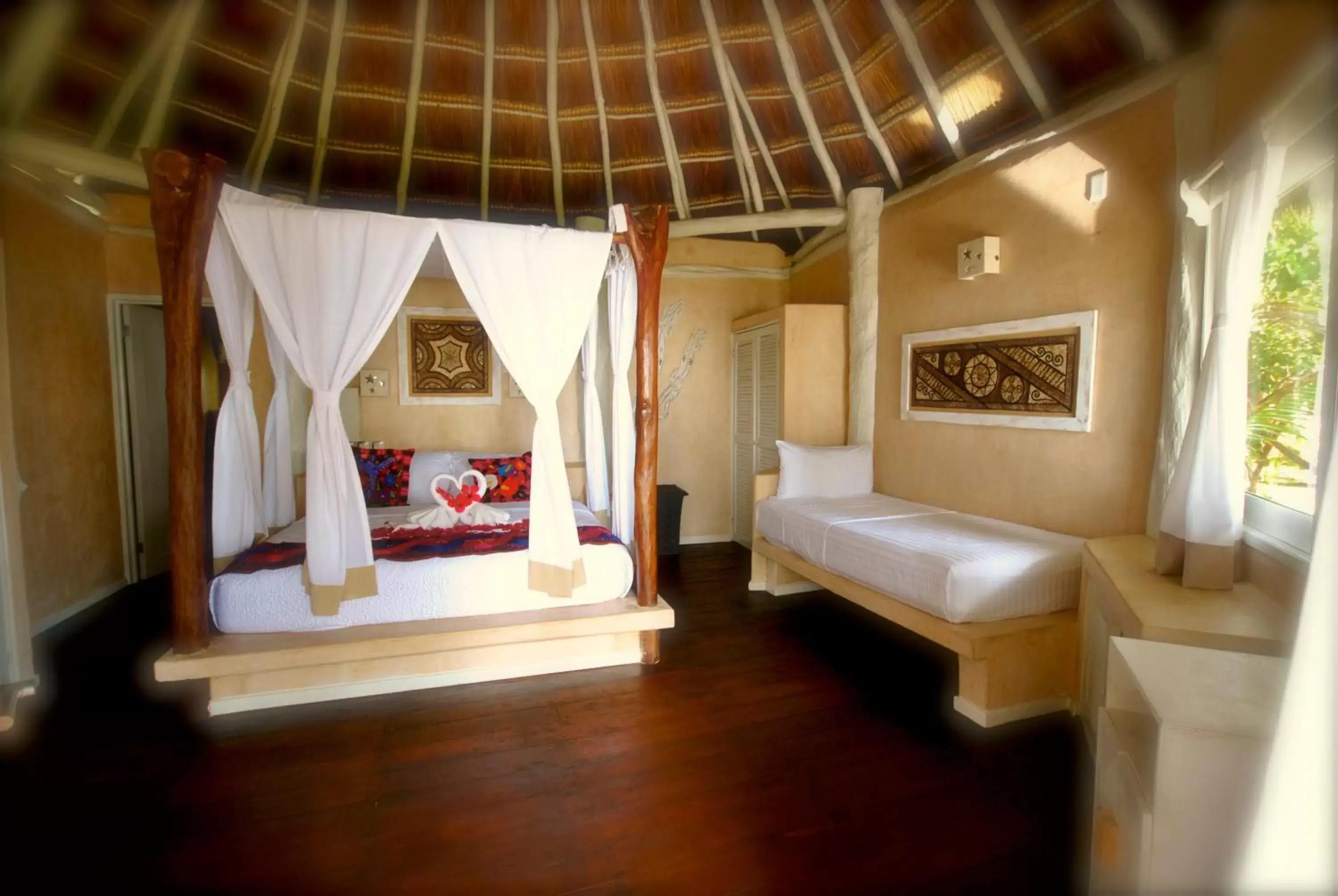 Bed in Villa Las Estrellas Tulum - located at the party zone