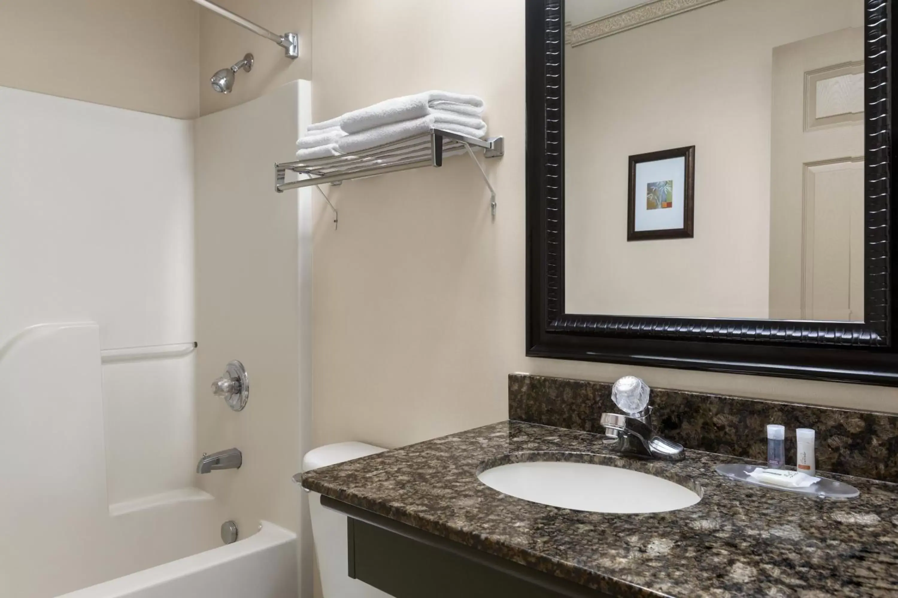 Bathroom in Days Inn & Suites by Wyndham Sault Ste. Marie ON