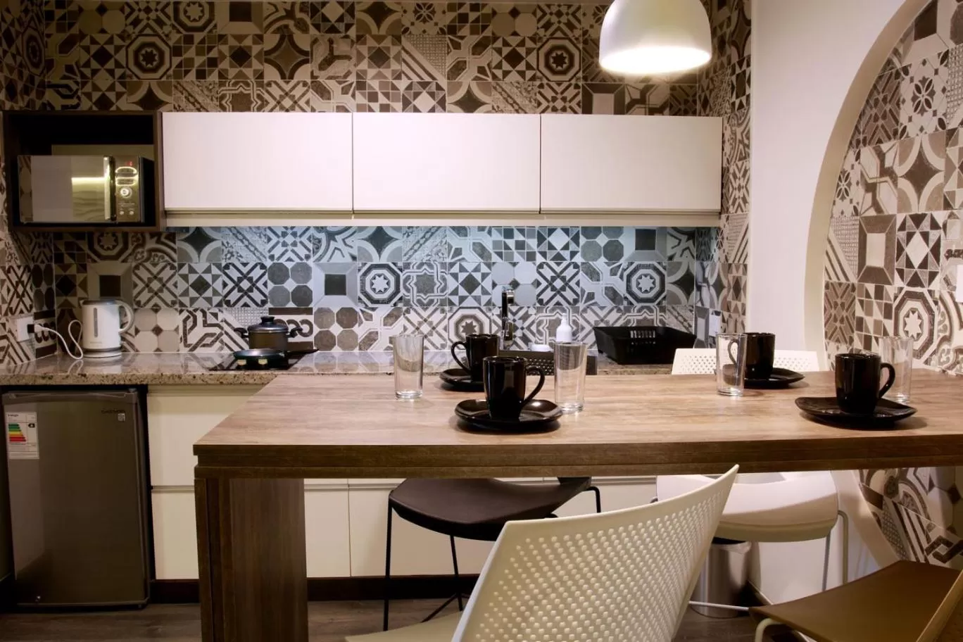 Kitchen or kitchenette in Urban Suites Apart Hotel