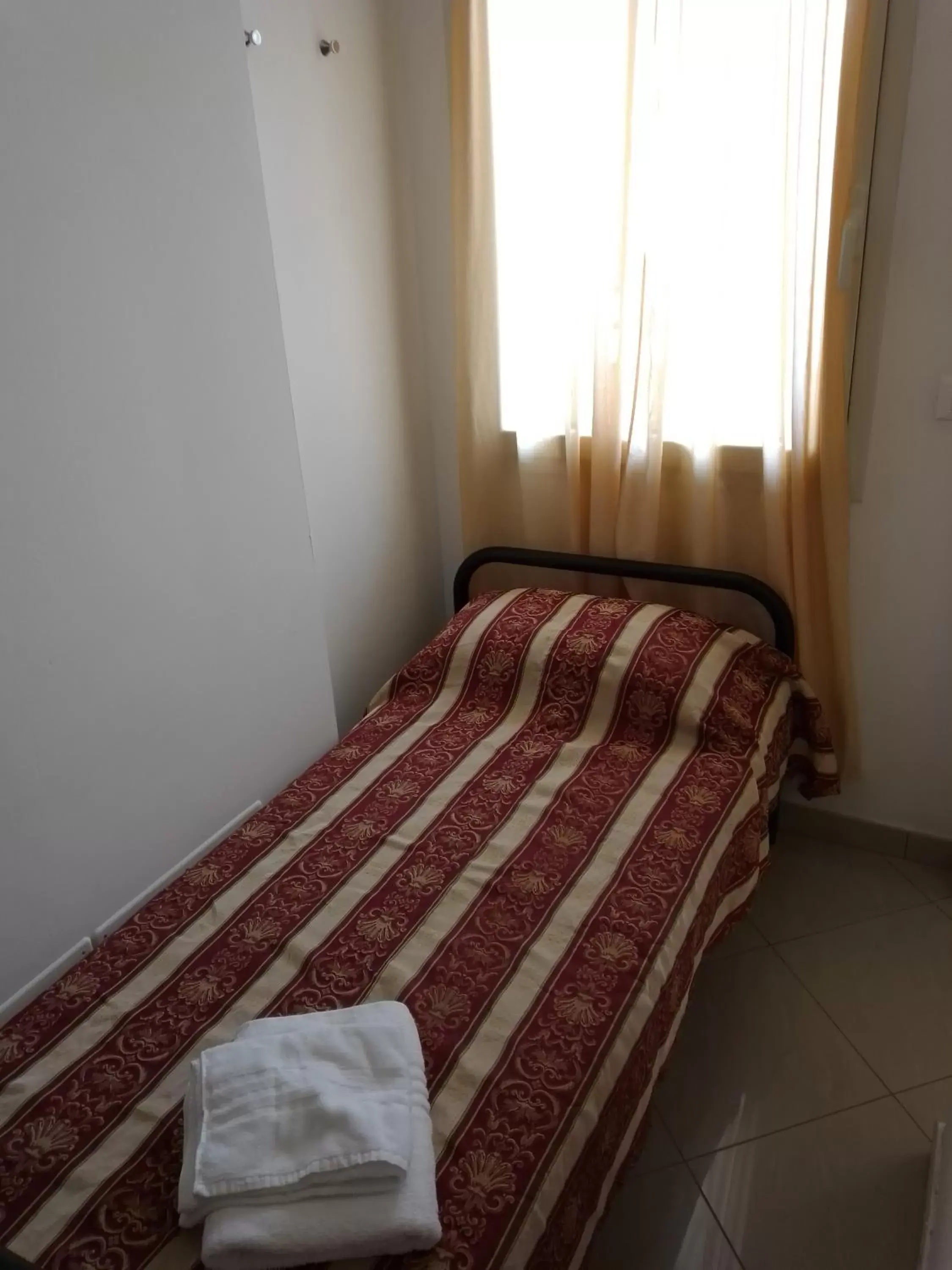 Bed in Hotel Riposo