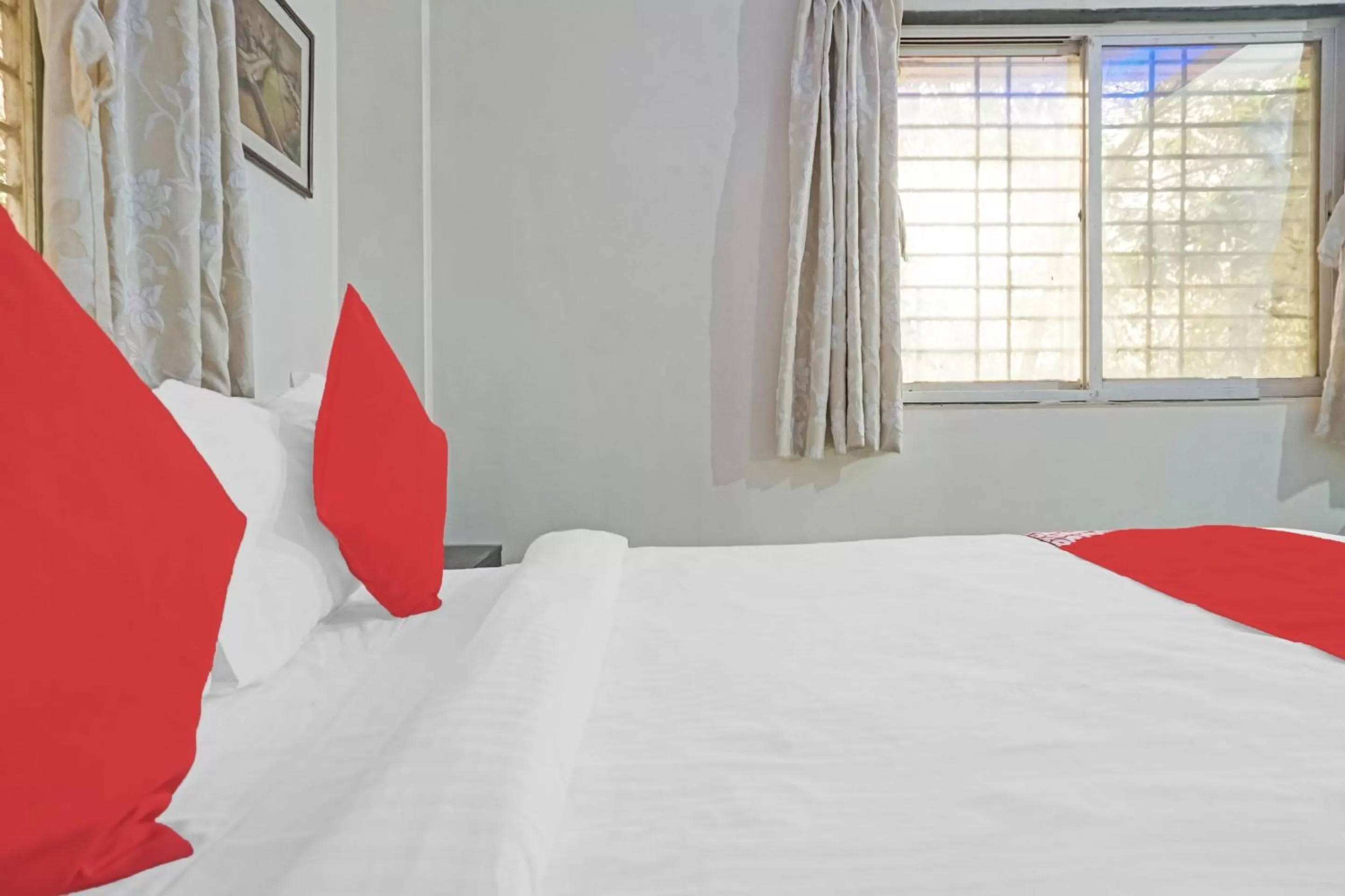 Bedroom, Bed in OYO Flagship 87488 Motel Excellency