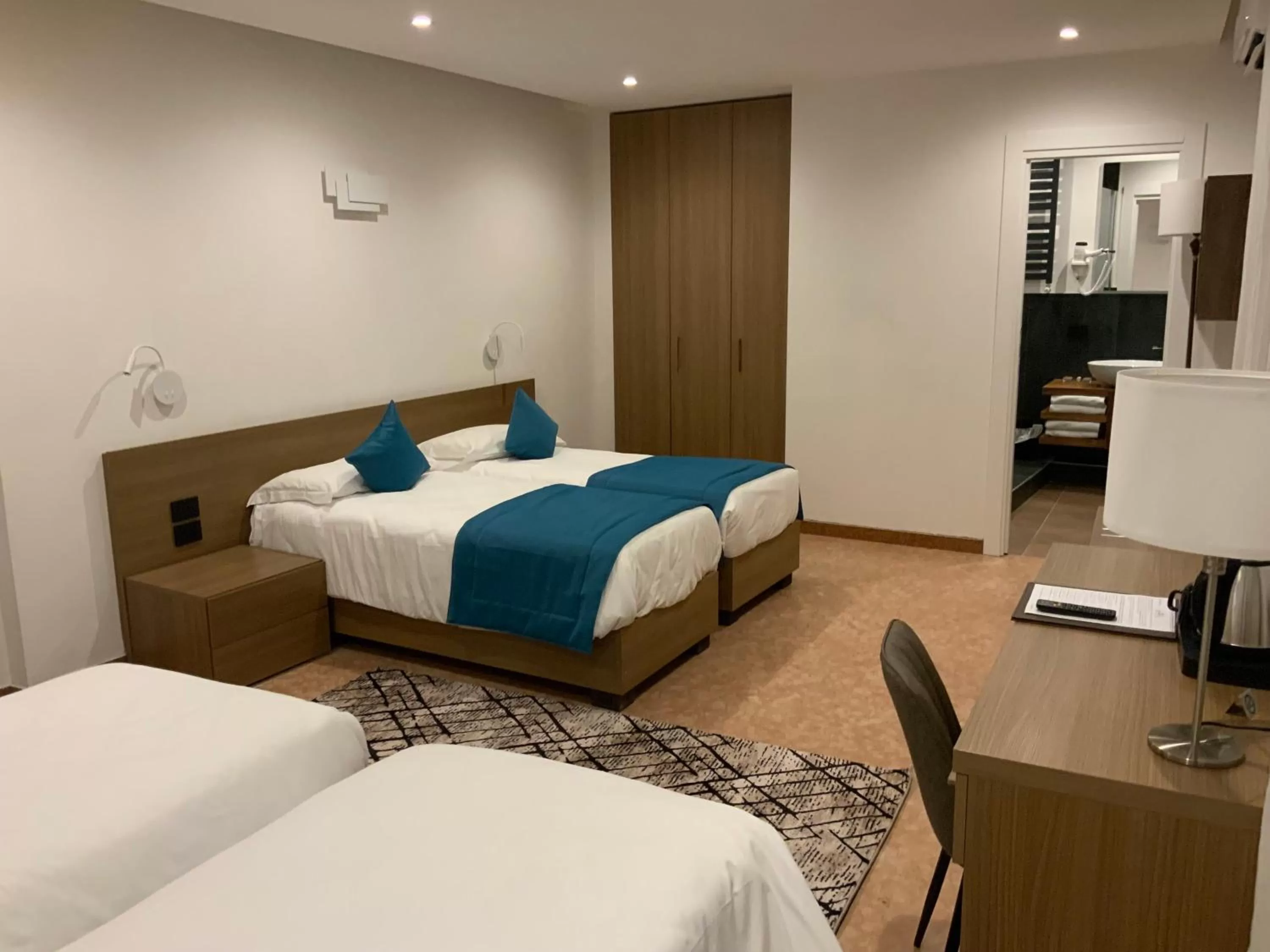 Bed in Albergo Cappello e Cadore