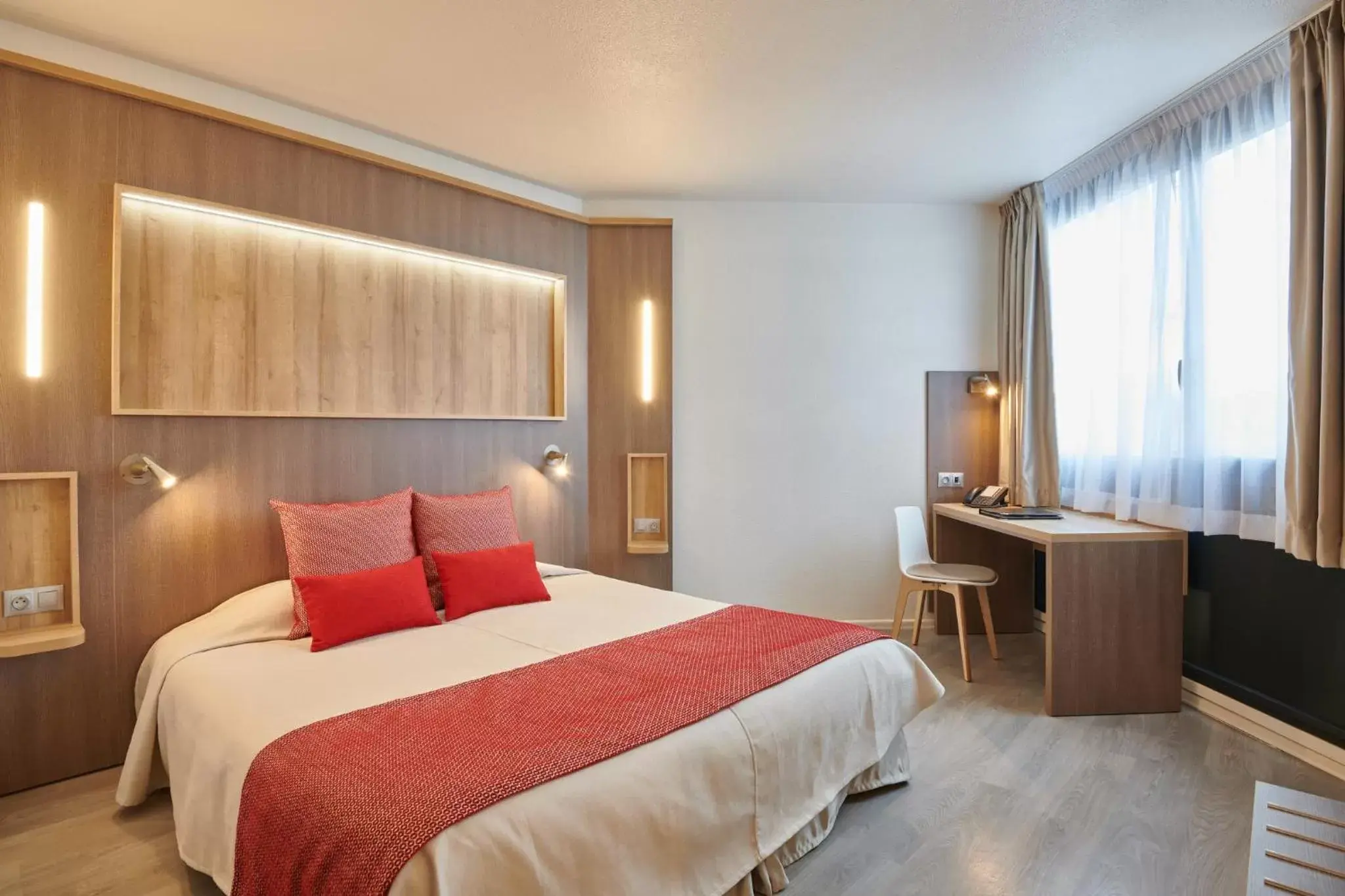 Bed in Hôtel Le Bayonne Bed in Hôtel Le Bayonne