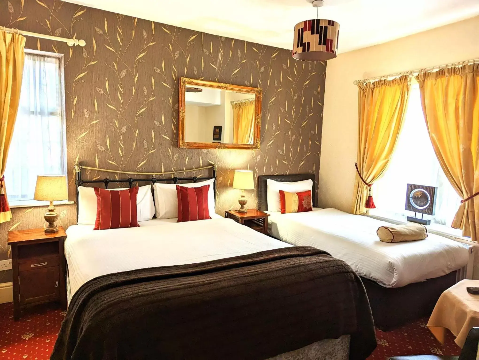 Bed in Brookside Hotel & Restaurant