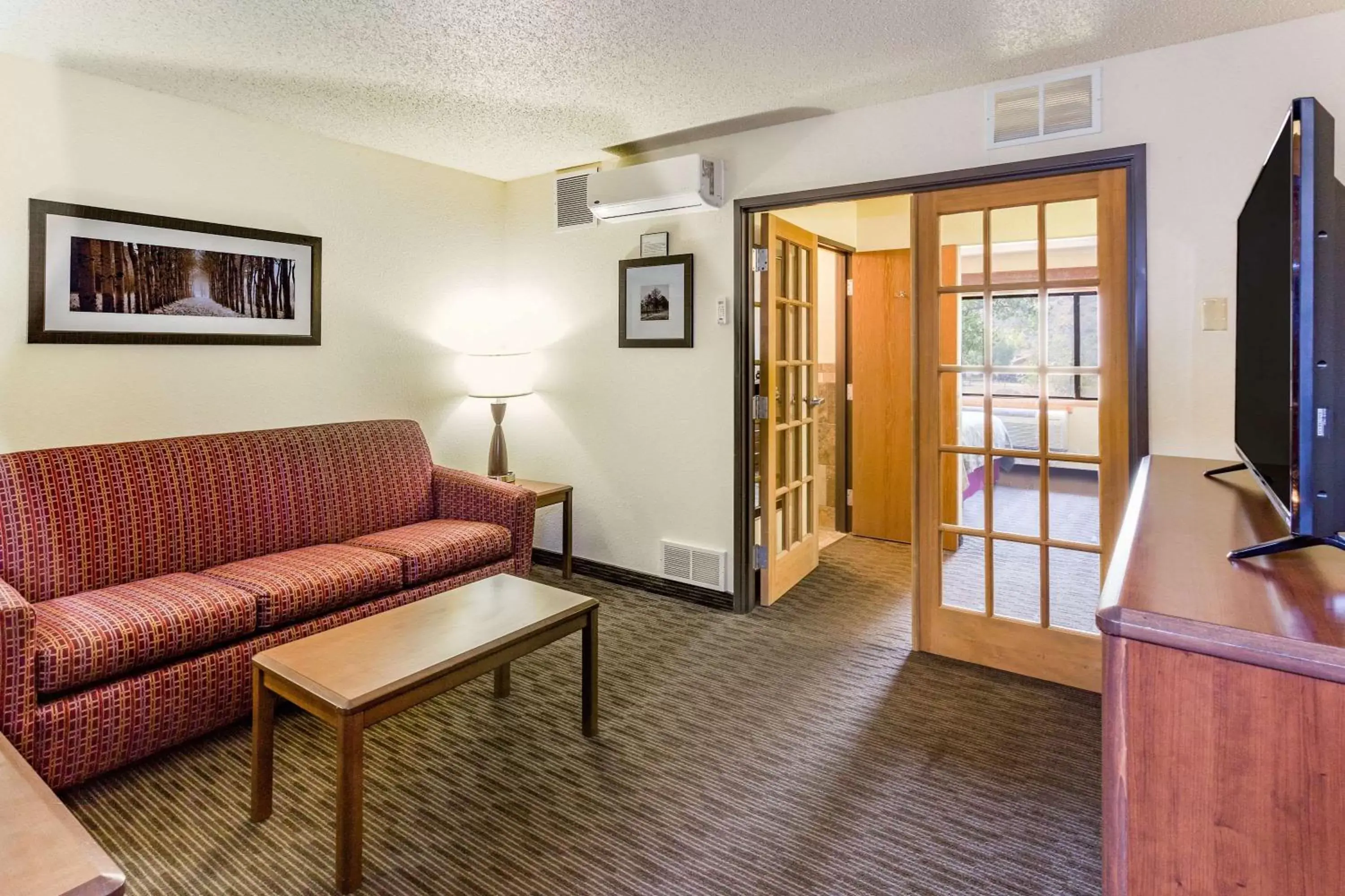 Photo of the whole room, Seating Area in AmericInn by Wyndham Medora