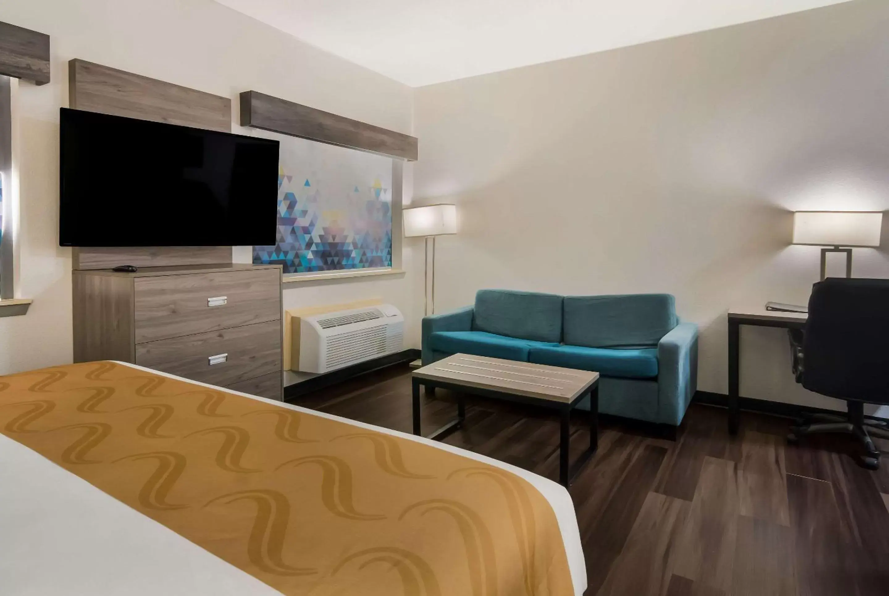 Bedroom, Seating Area in Quality Inn & Suites