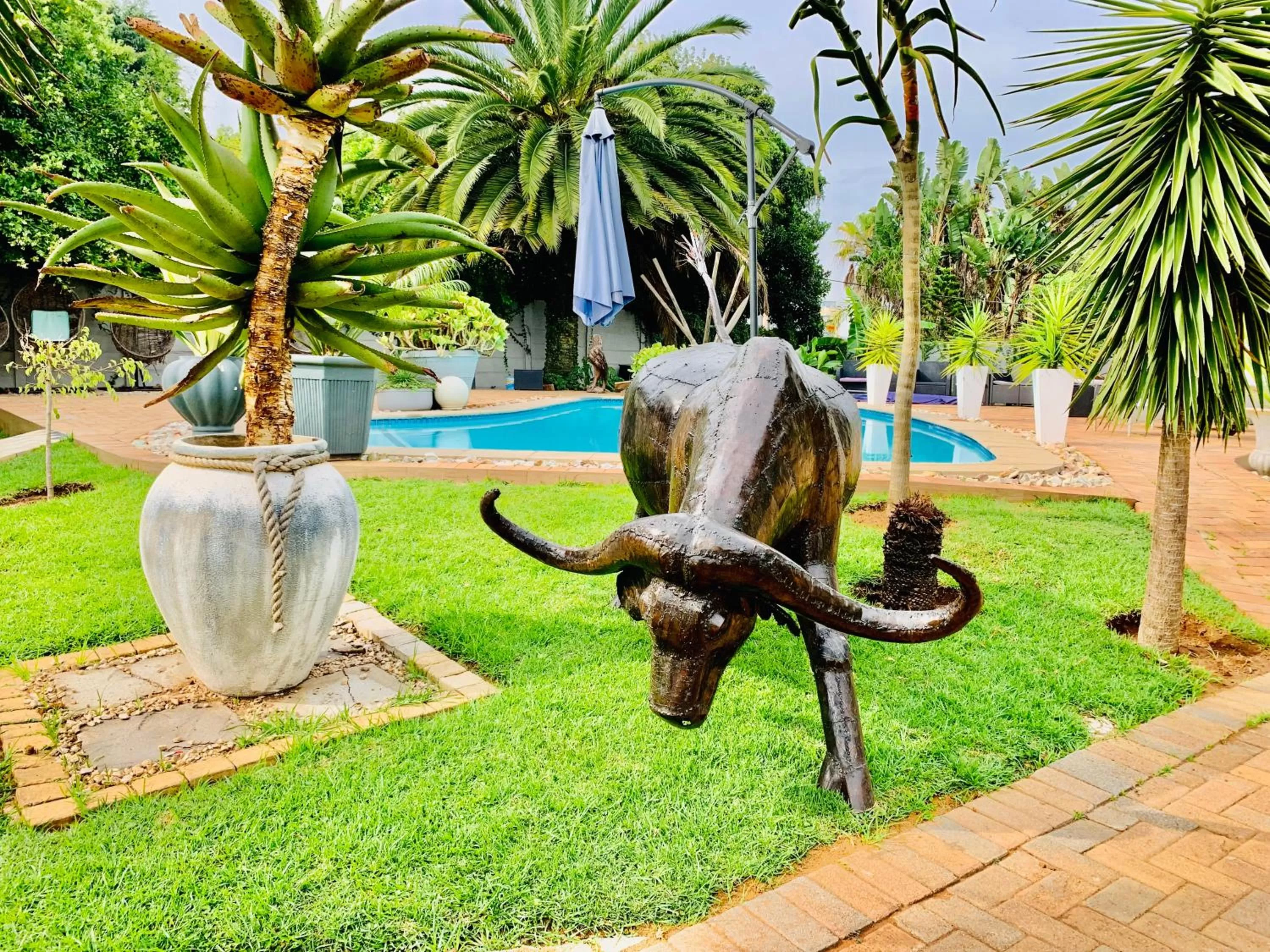 Garden, Swimming Pool in 24 On Basil Inventive suites