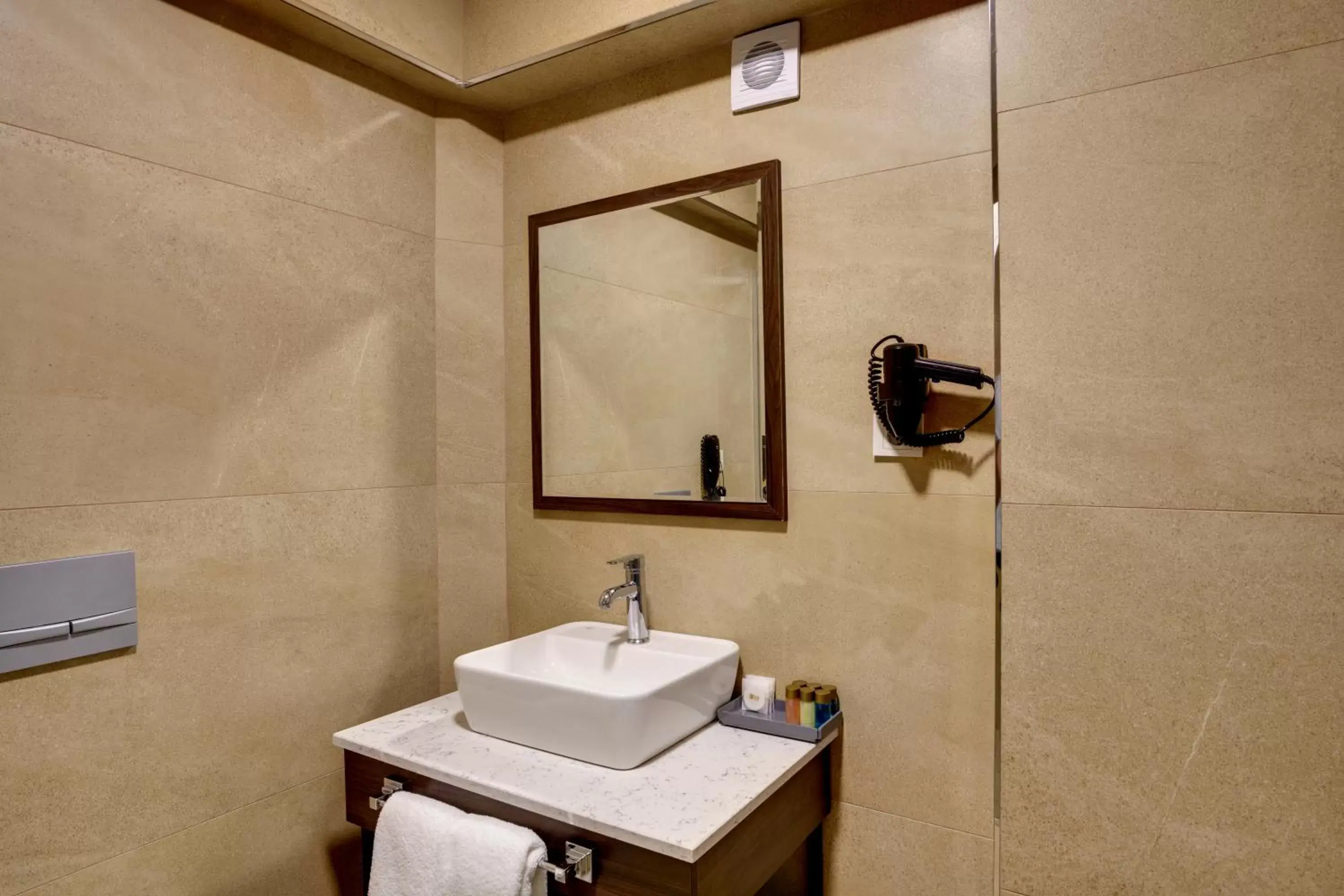 Toilet, Bathroom in Leo Suites