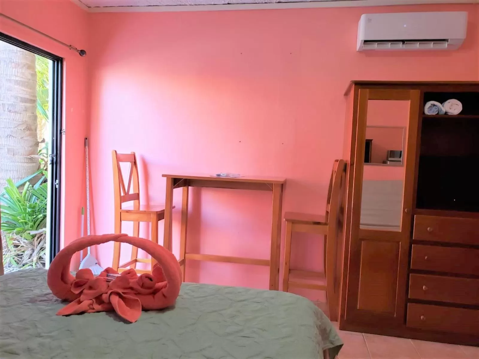 Bed in Beach Side Condos Caye Caulker by CCVH