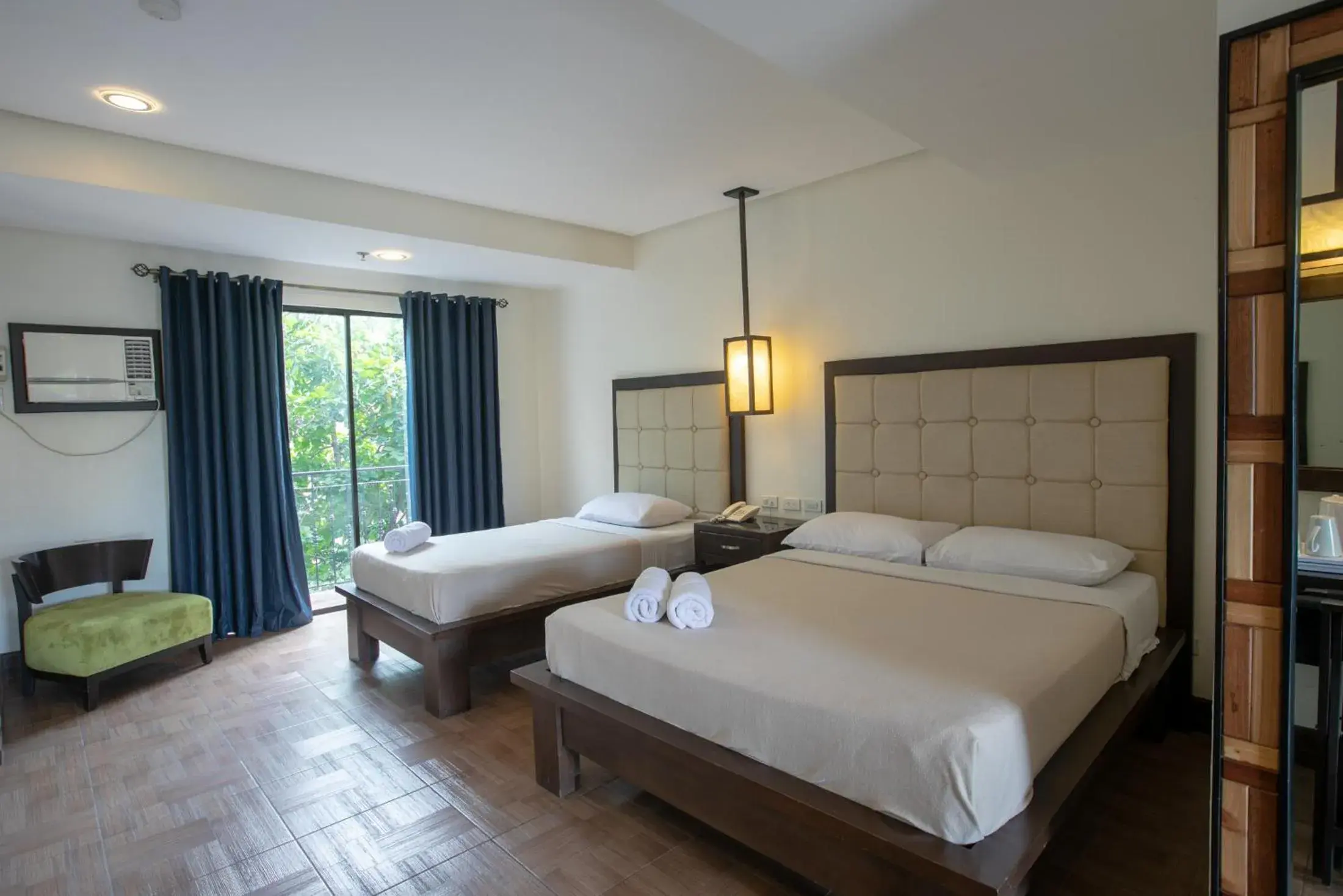 Bed in Rosvenil Hotel