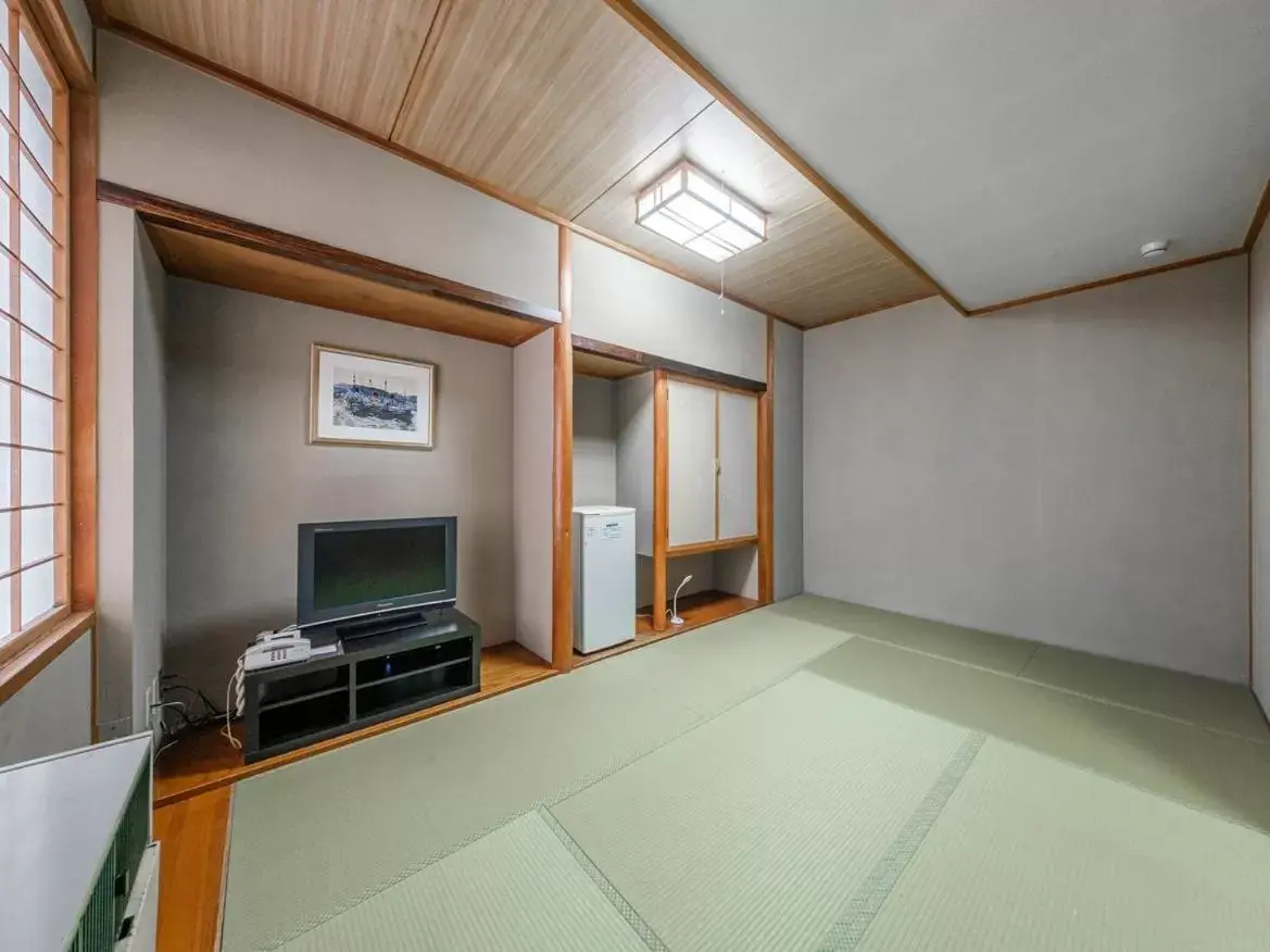 Photo of the whole room, TV/Entertainment Center in Tabist THE GREEN OTARU