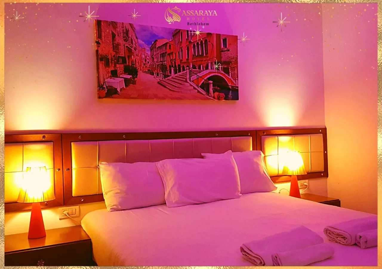 Bed in Assaraya Palace Hotel