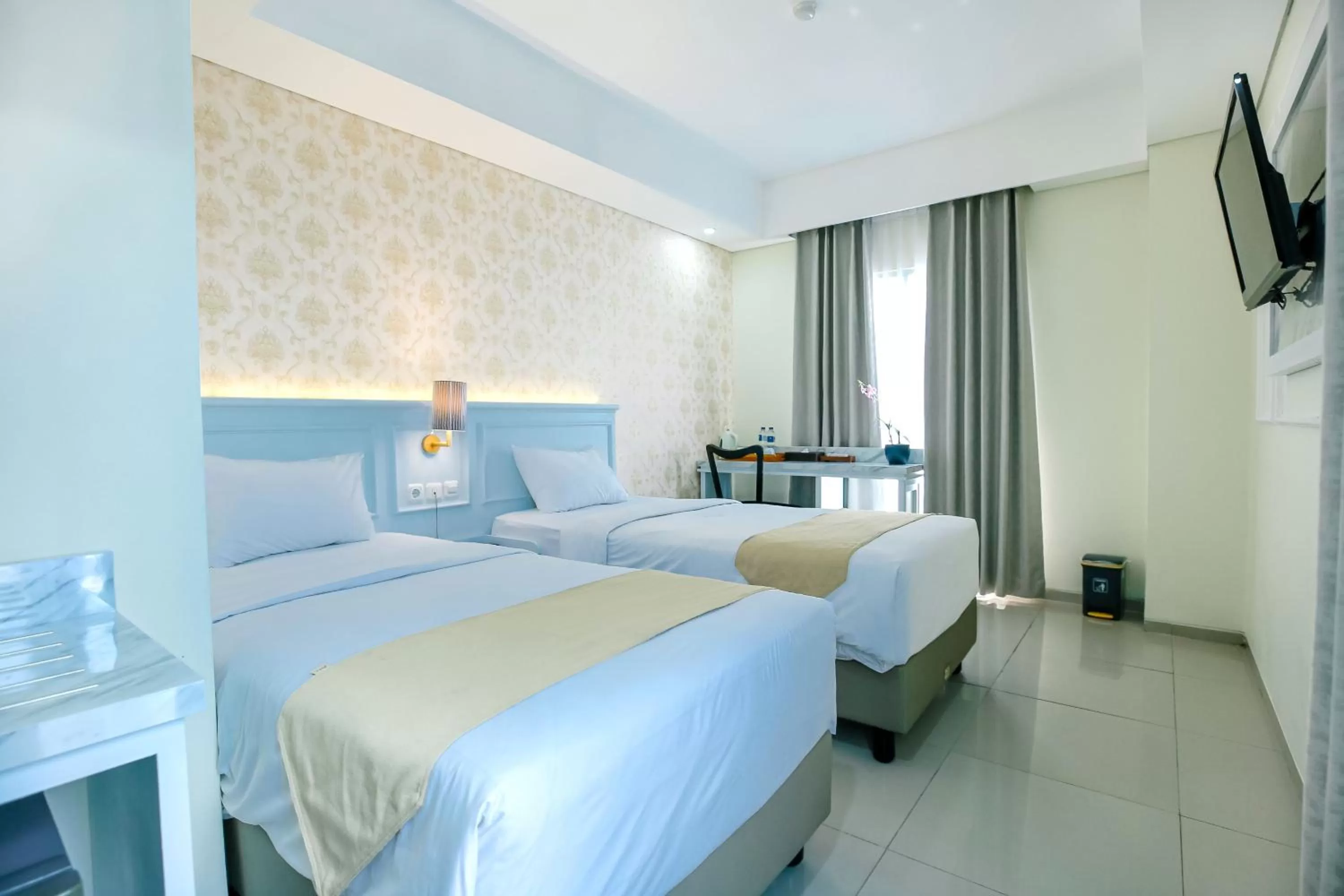 Bed in The Cube Hotel Malioboro, Azana Hotels Collection