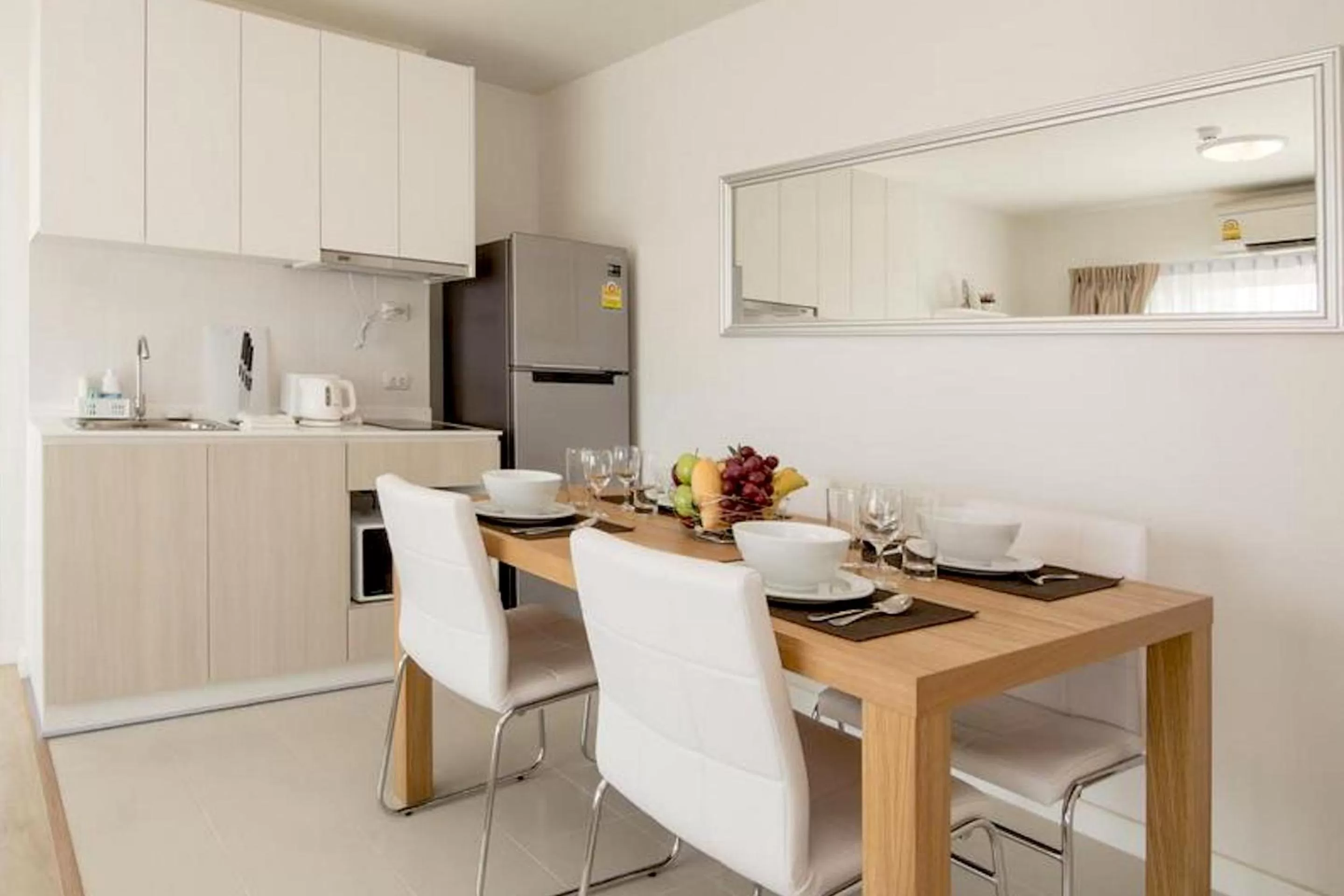 Kitchen or kitchenette in First Choice Suites by the Sea SHA Plus Extra