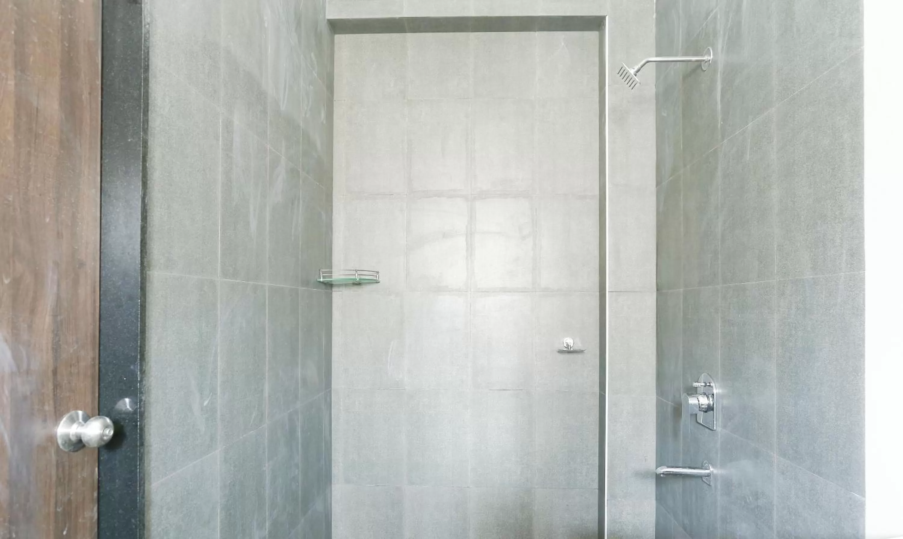 Bathroom in Treebo Hi Line Apartments Kalapatti