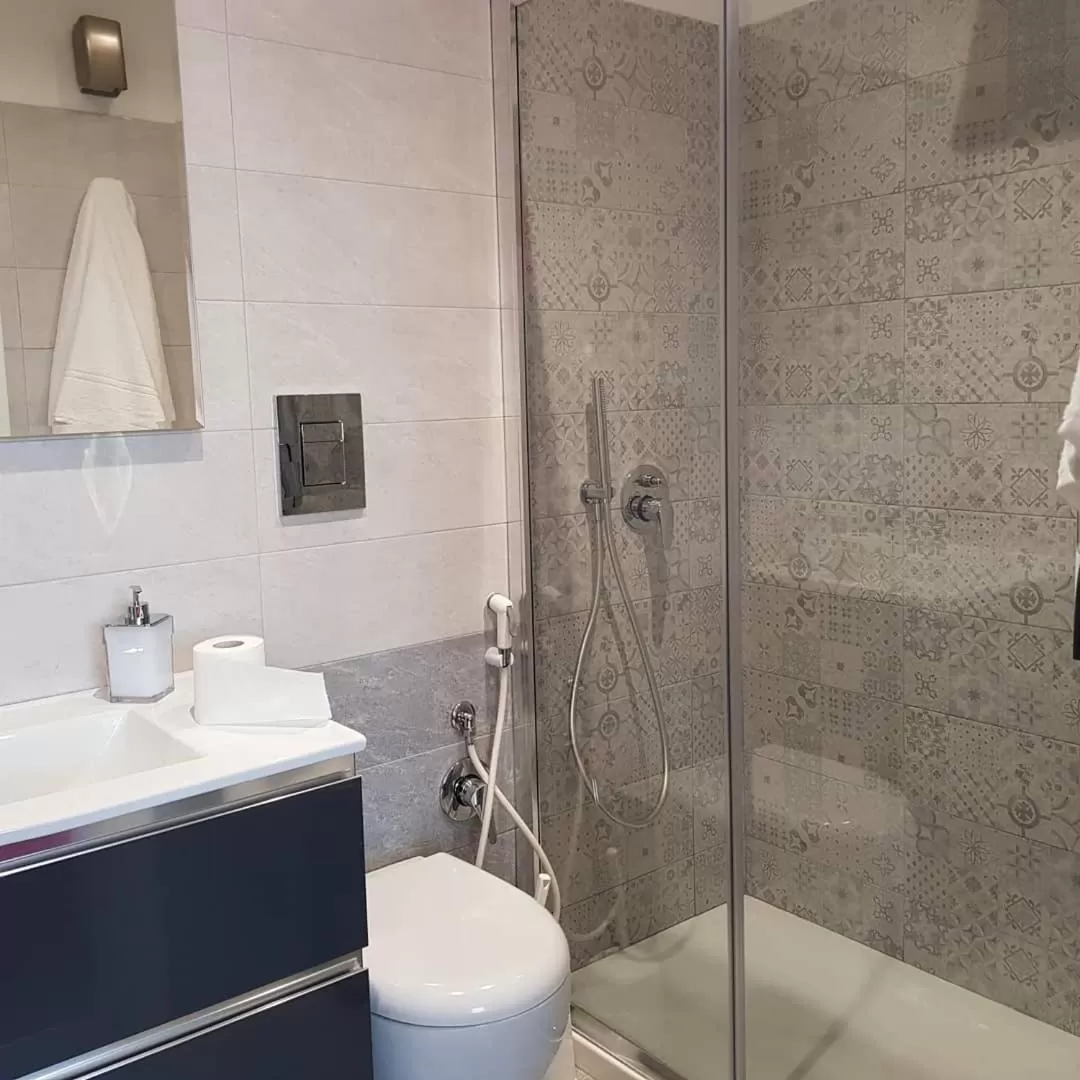 Bathroom in 2B Fifteen Floor Suite Napoli