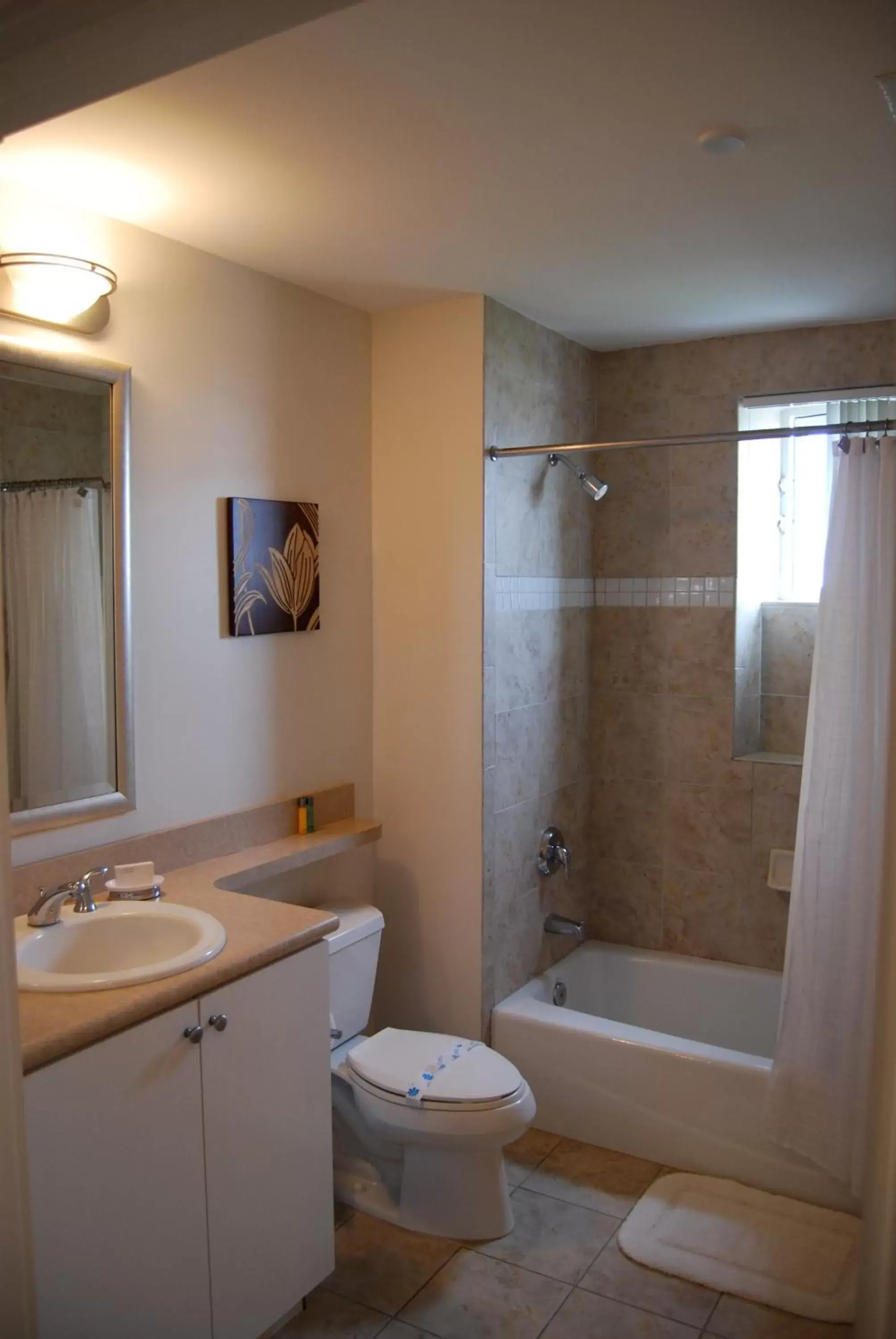 Bathroom in Dadeland Towers by Miami Vacations