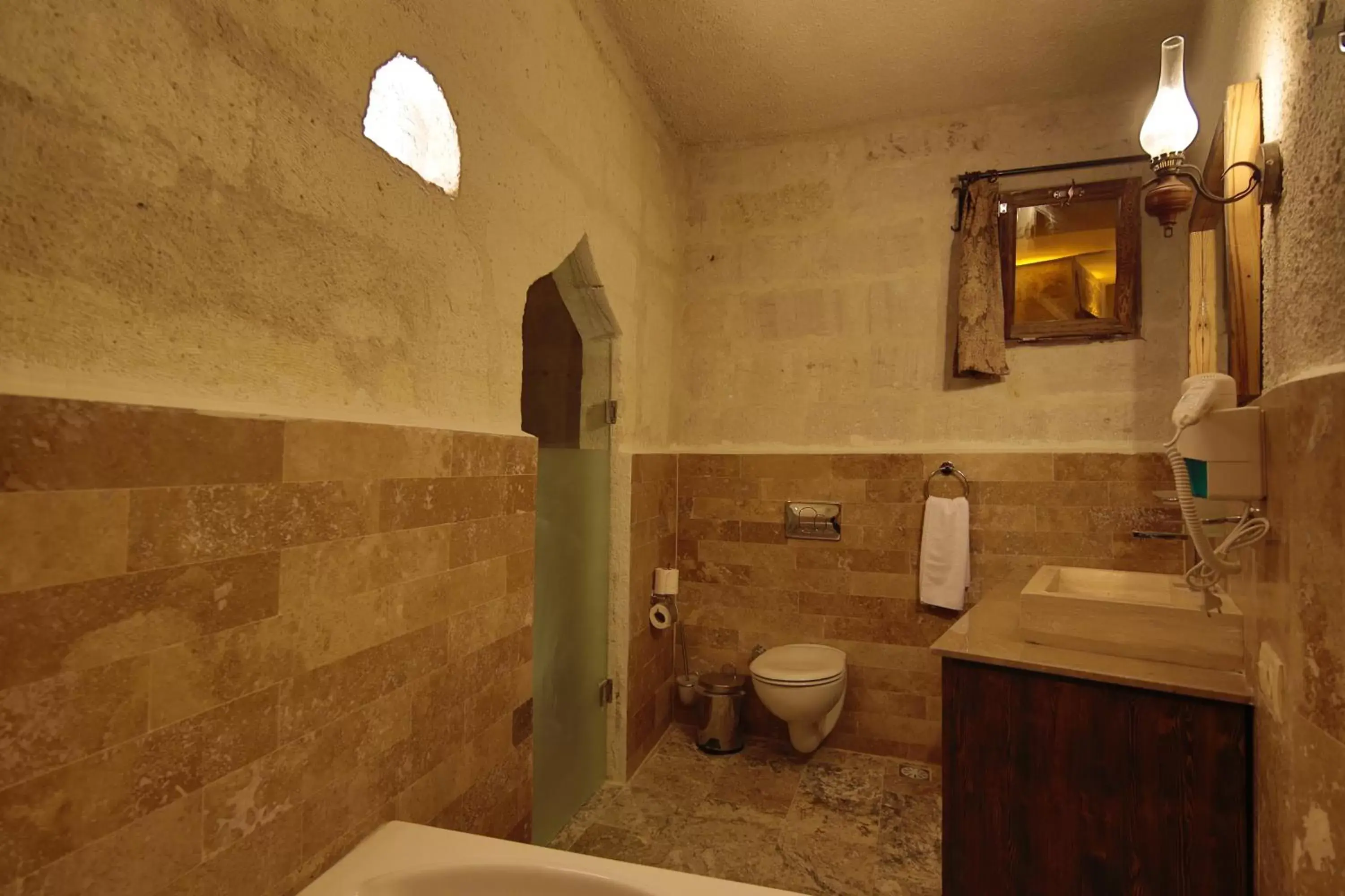 Toilet, Bathroom in Hidden Cave Hotel