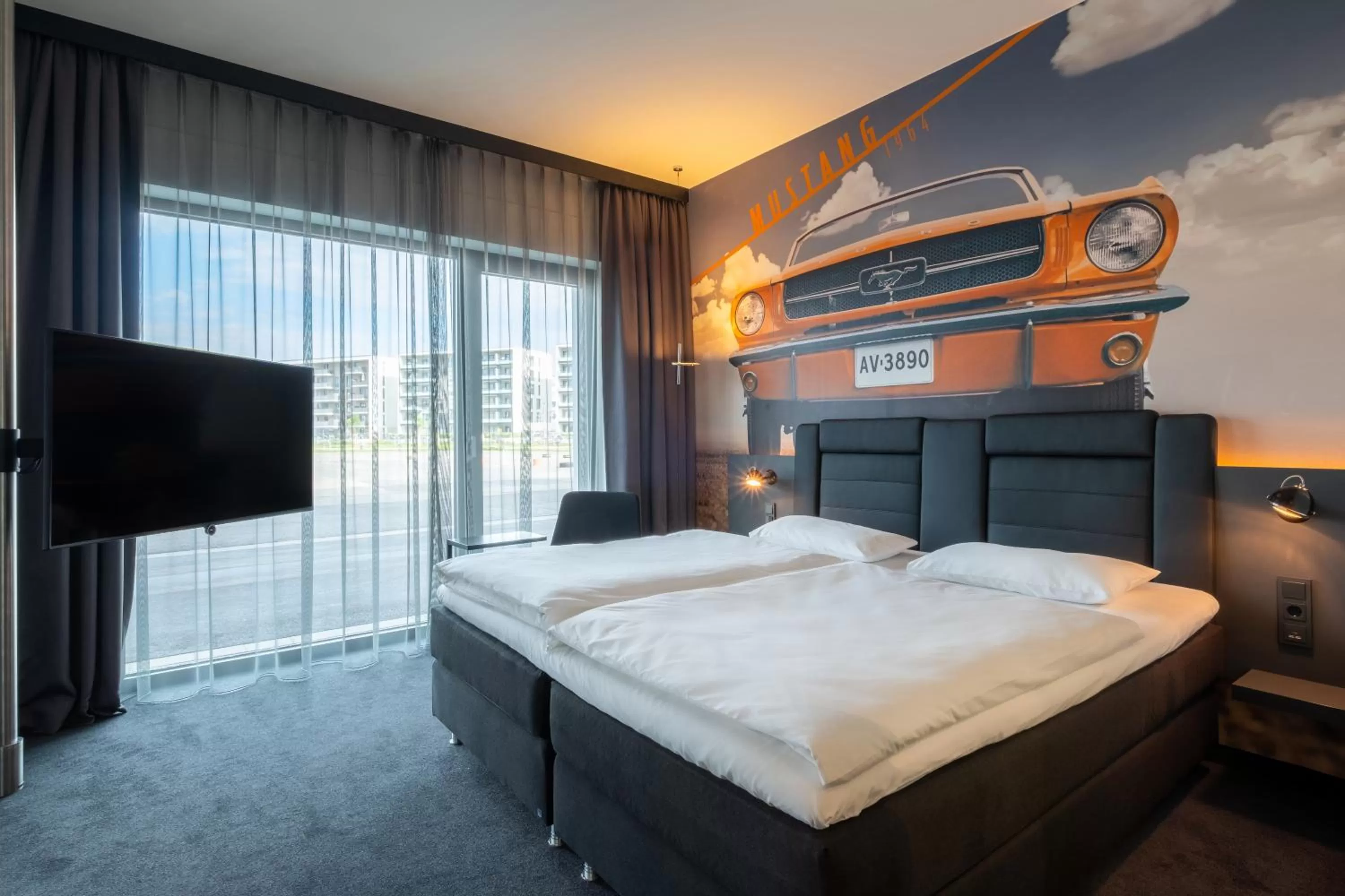 Photo of the whole room, Bed in V8 Hotel Köln at MOTORWORLD