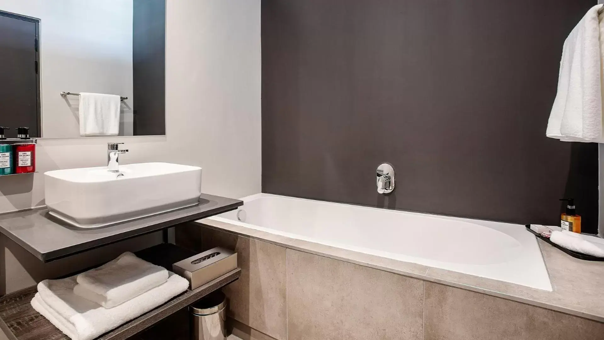 Bathroom in The Catalyst Apartment Hotel by NEWMARK